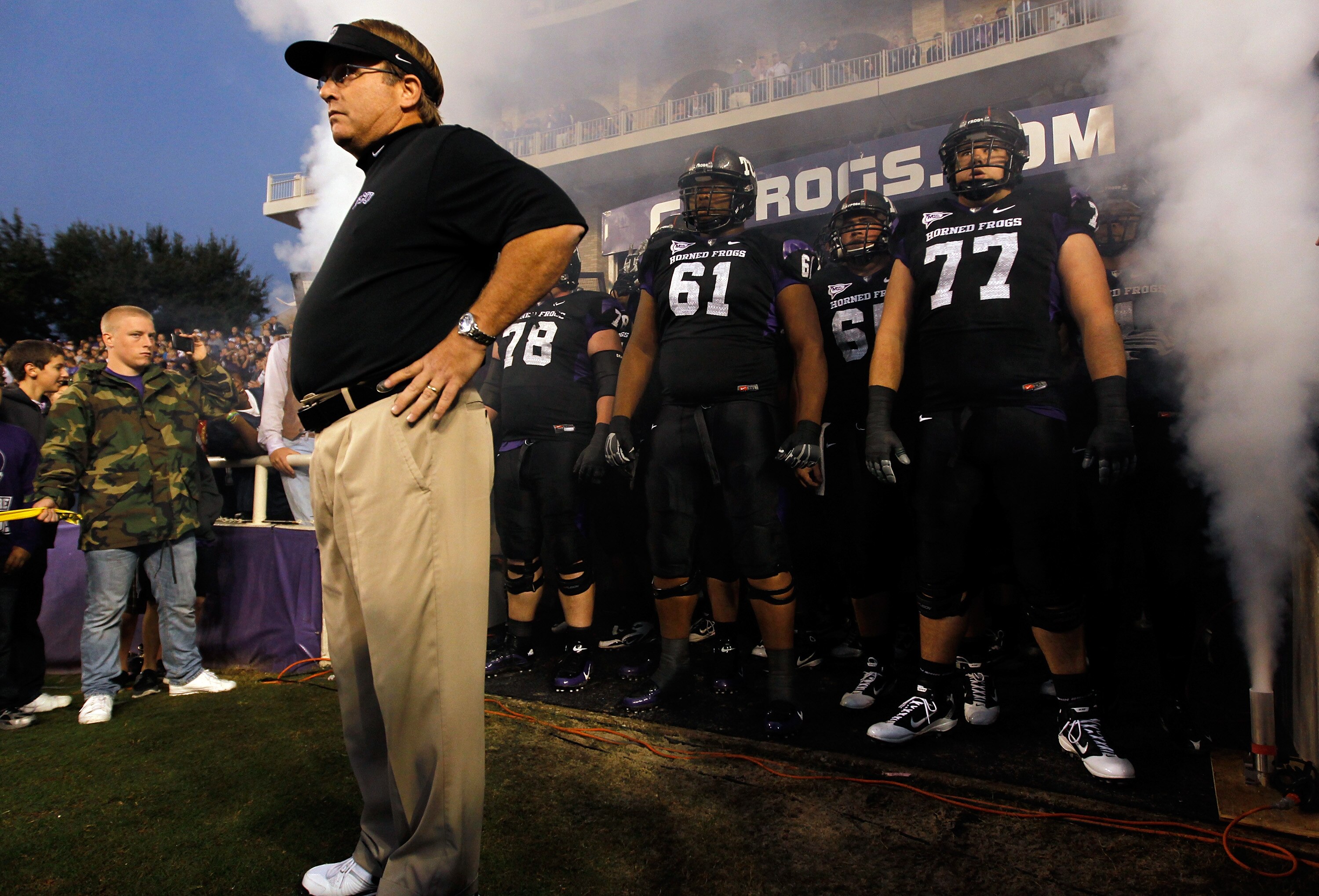 FORT WORTH, TX - OCTOBER 23: Head coach Gary Patterson of the TCU Horned Frogs leads his team on the field against the Air Force Falcons at Amon G. Carter Stadium on October 23, 2010 in Fort Worth, Texas. TCU beat Air Force 38-7. (Photo by Tom Penningto FORT WORTH, TX - OCTOBER 23: Head coach Gary Patterson of the TCU Horned Frogs leads his team on the field against the Air Force Falcons at Amon G. Carter Stadium on October 23, 2010 in Fort Worth, Texas. TCU beat Air Force 38-7. (Photo by Tom Penningto