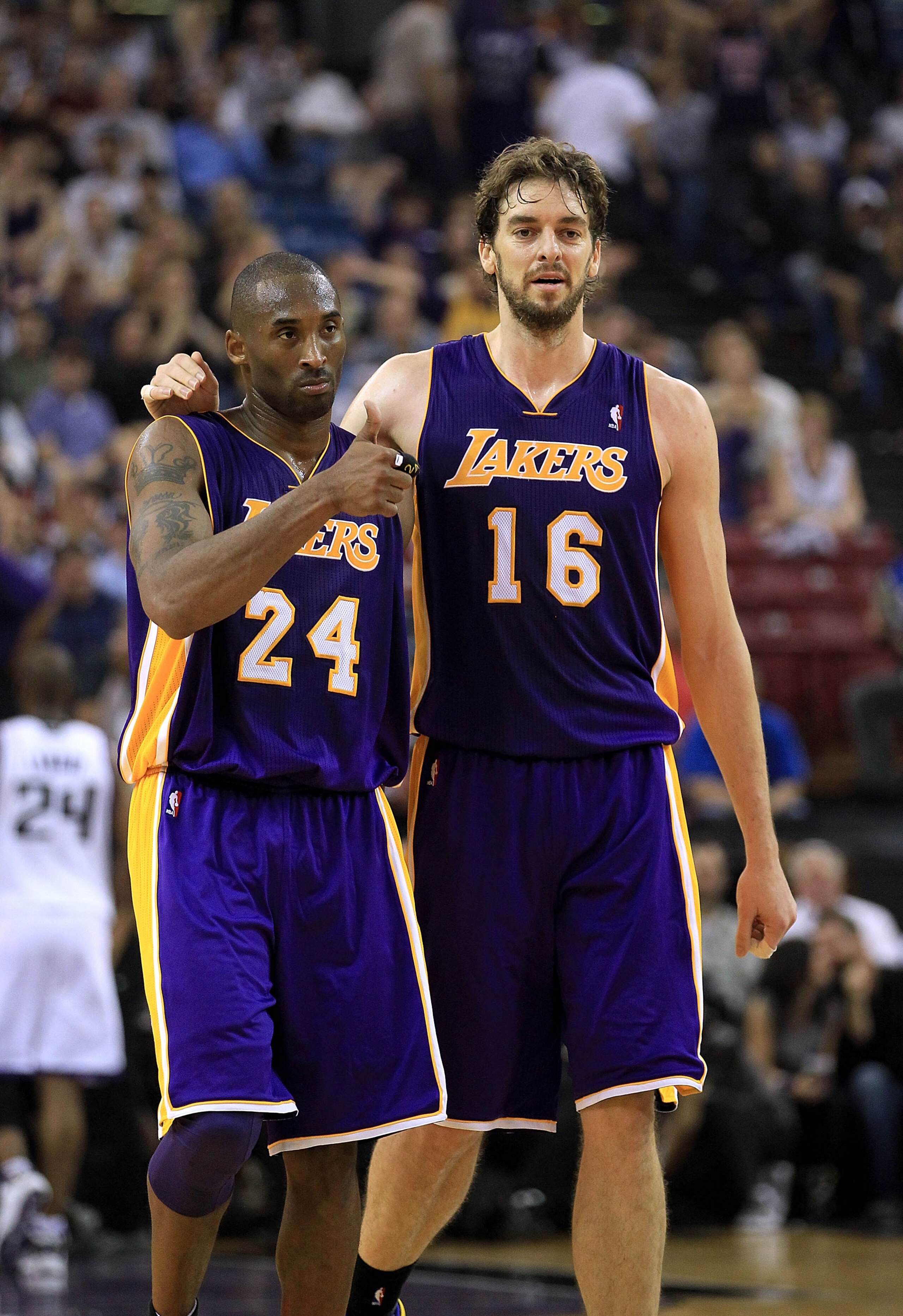 SACRAMENTO, CA - NOVEMBER 03:  Kobe Bryant #24 and Pau Gasol #16 of the Los Angeles Lakers walk off the court for halftime after the Lakers made a last second shot against the Sacramento Kings at ARCO Arena on November 3, 2010 in Sacramento, California.  