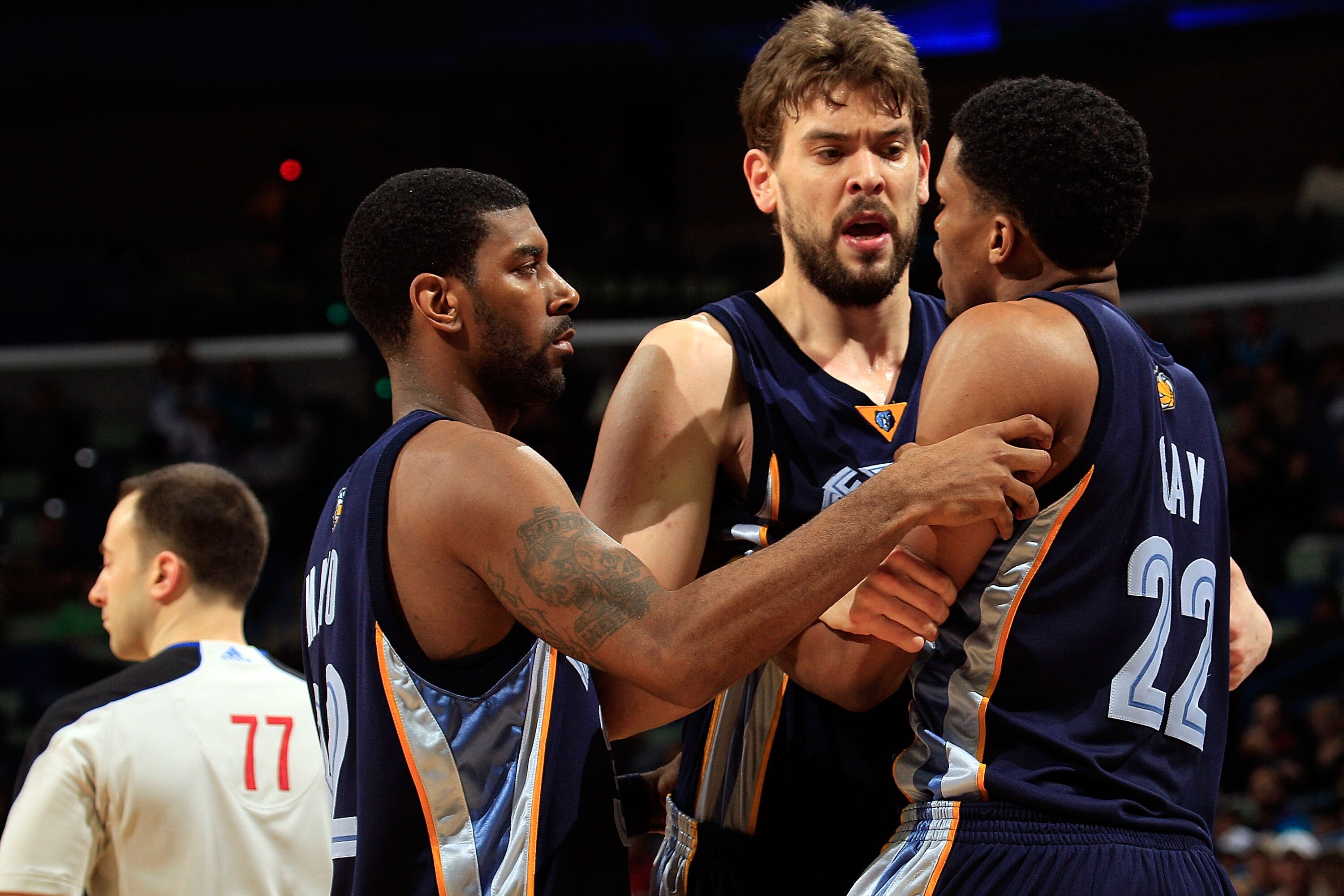 NEW ORLEANS - MARCH 03:  O.J. Mayo #32 and Marc Gasol #33 hold back Rudy Gay #22 of the Memphis Grizzlies after drawing a technical foul for arguing with a referee during the game against the New Orleans Hornets at the New Orleans Arena on March 3, 2010 i