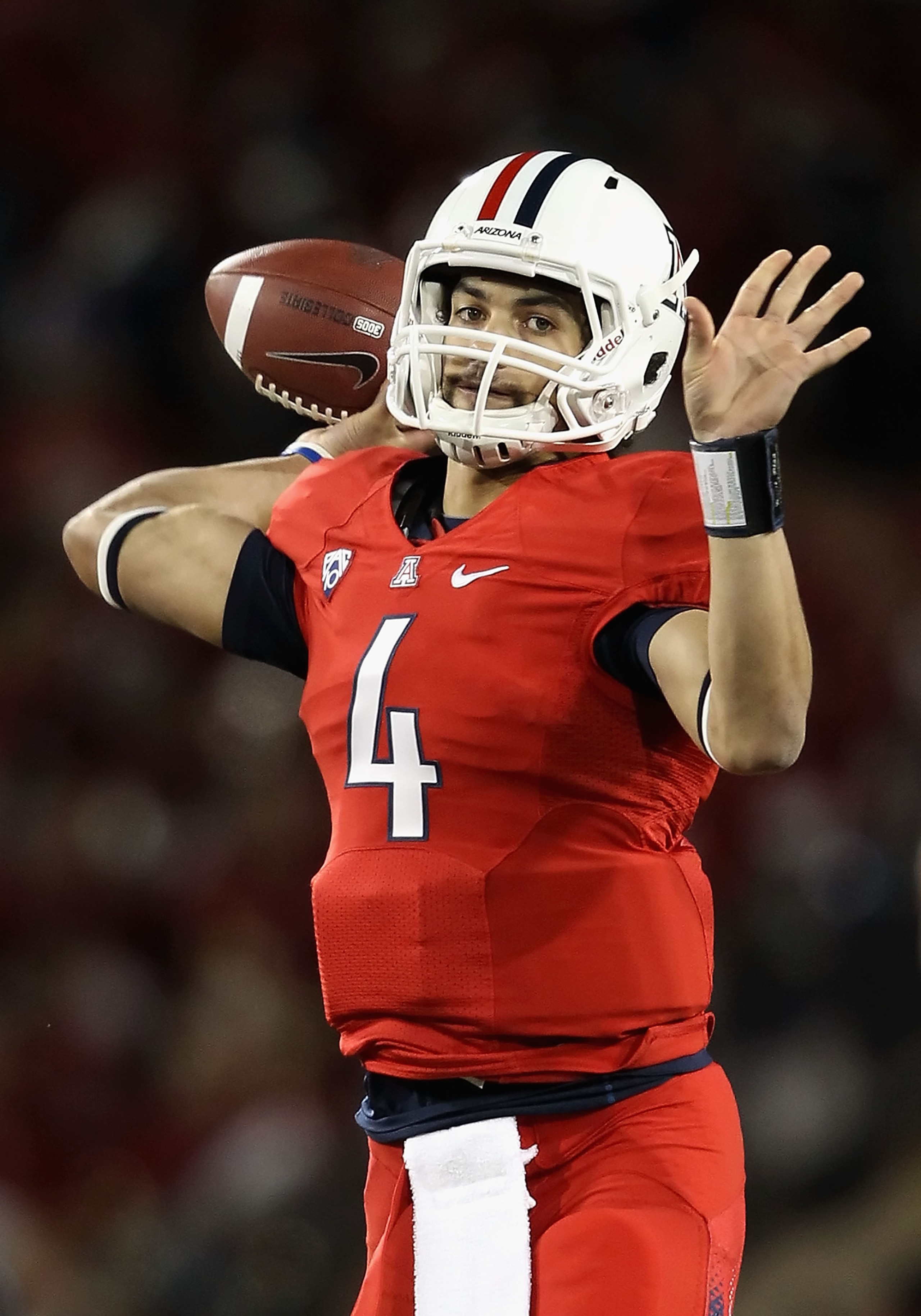 TUCSON, AZ - OCTOBER 23: Quarterback Matt Scott #4 of the Arizona Wildcats throws a pass during the college football game against the Washington Huskies at Arizona Stadium on October 23, 2010 in Tucson, Arizona. (Photo by Christian Petersen/Getty Images TUCSON, AZ - OCTOBER 23: Quarterback Matt Scott #4 of the Arizona Wildcats throws a pass during the college football game against the Washington Huskies at Arizona Stadium on October 23, 2010 in Tucson, Arizona. (Photo by Christian Petersen/Getty Images