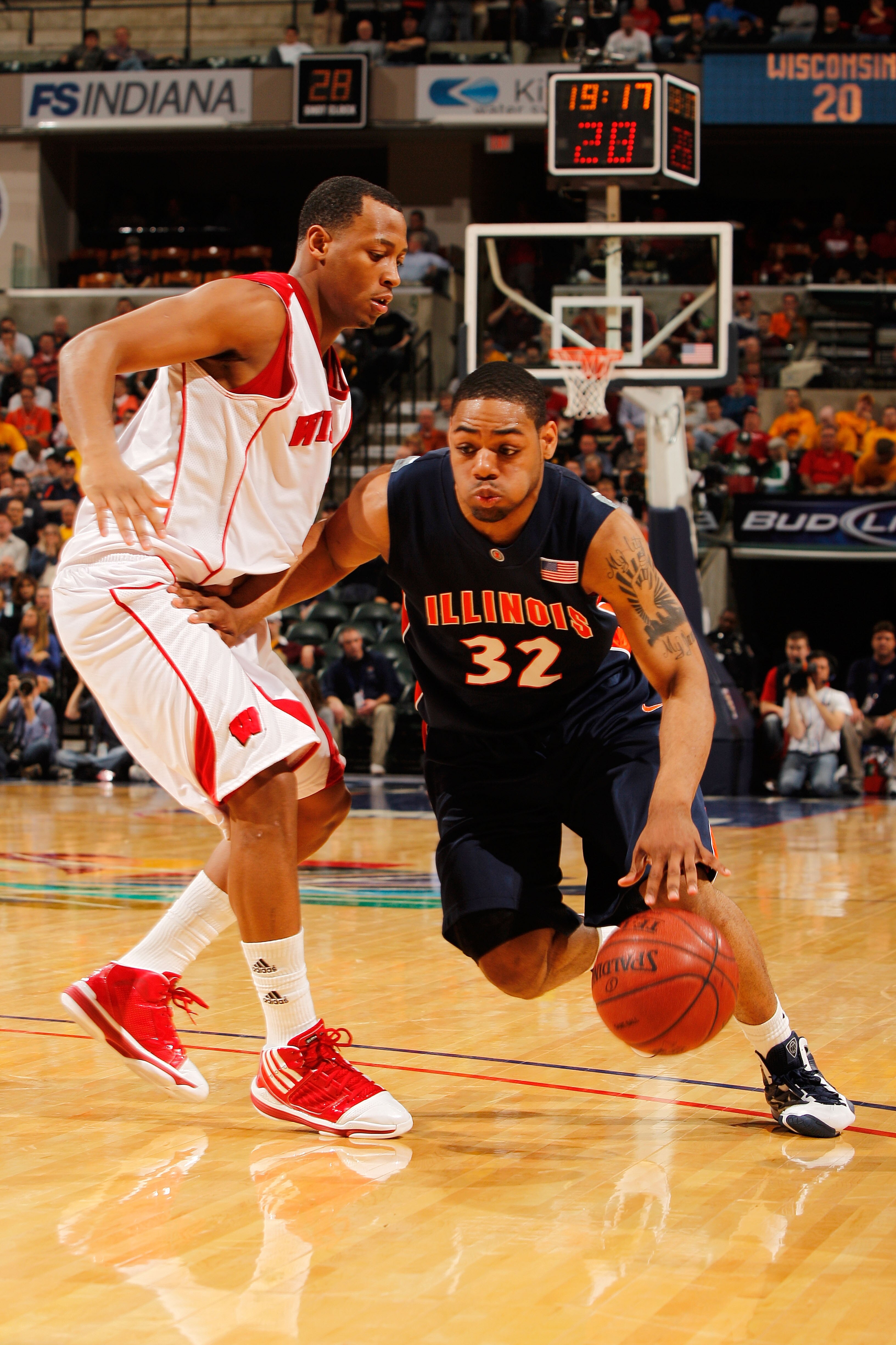 INDIANAPOLIS - MARCH 12:  Guard Demetri McCamey #32 of the Illinois Fighting Illini drives with the ball against the Wisconsin Badgers during the quarterfinals of the Big Ten Men's Basketball Tournament at Conseco Fieldhouse on March 12, 2010 in Indianapo