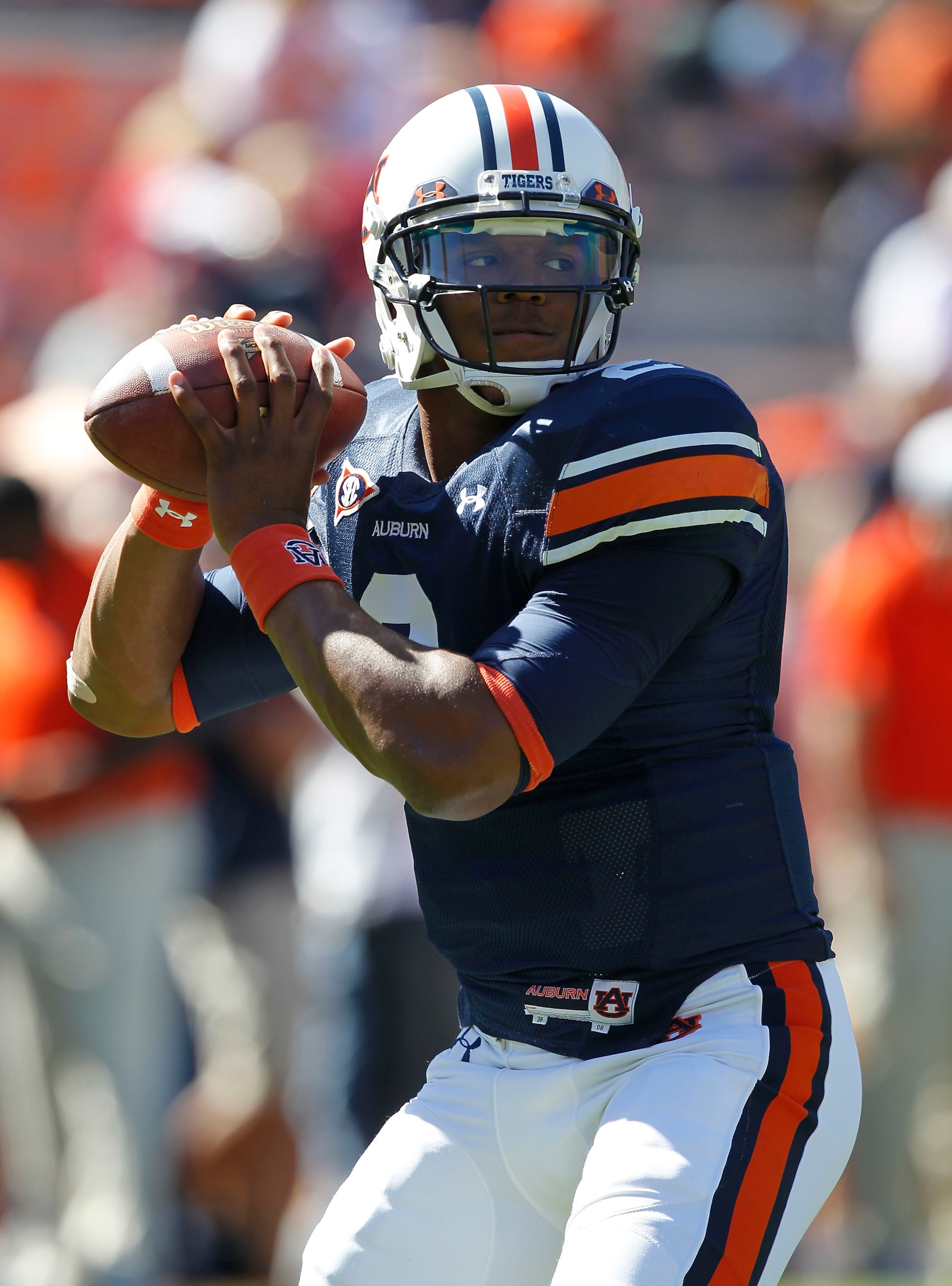 AUBURN, AL - OCTOBER 16:  Quarterback Cam Newton #2 of the Auburn Tigers drops back to throw a practice pass before the game against the Arkansas Razorbacks at Jordan-Hare Stadium on October 16, 2010 in Auburn, Alabama.  (Photo by Mike Zarrilli/Getty Imag