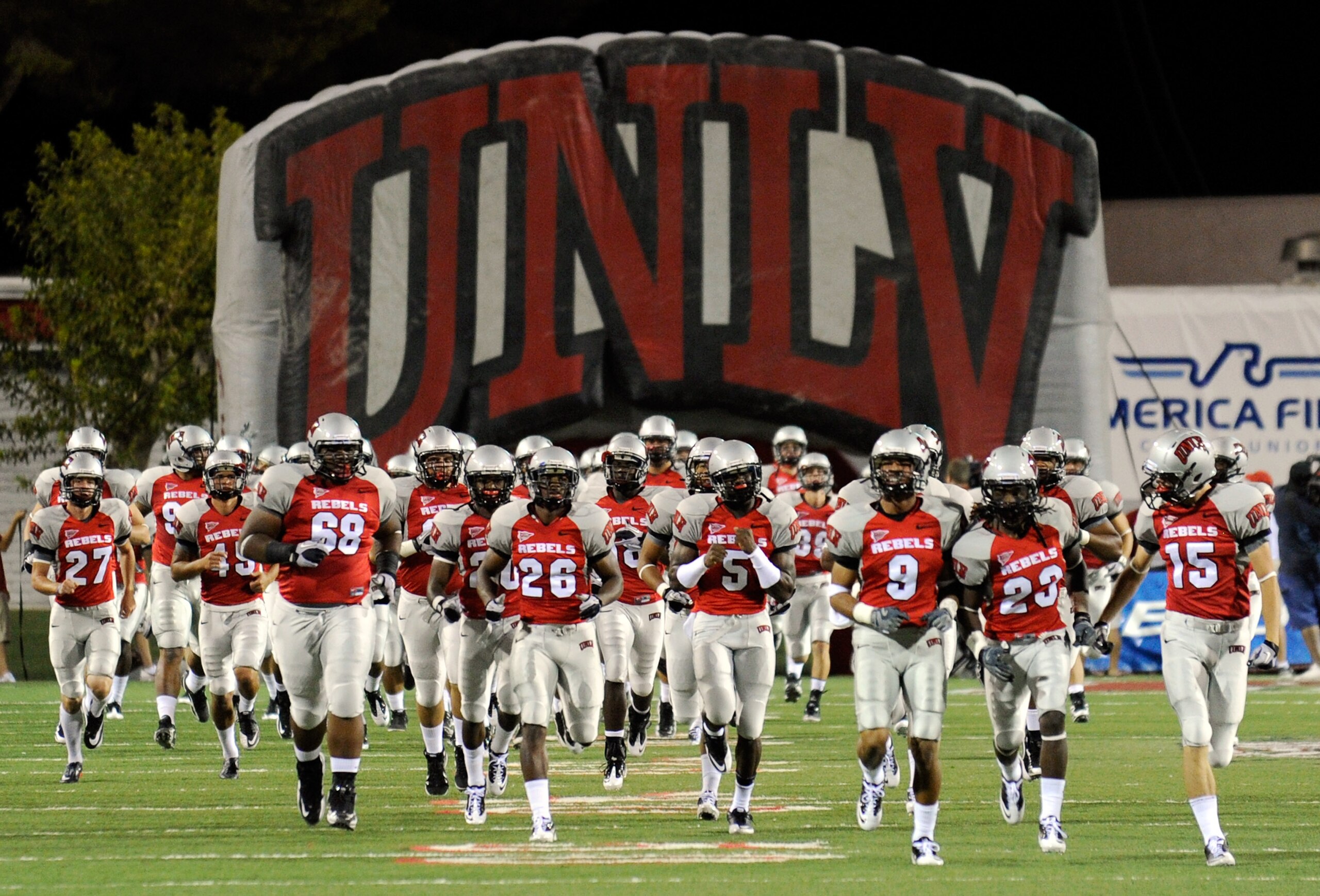 LAS VEGAS - SEPTEMBER 04:  The UNLV Rebels take the field for their season opener against the Wisconsin Badgers at Sam Boyd Stadium September 4, 2010 in Las Vegas, Nevada.  Wisconsin won 41-21.  (Photo by Ethan Miller/Getty Images)