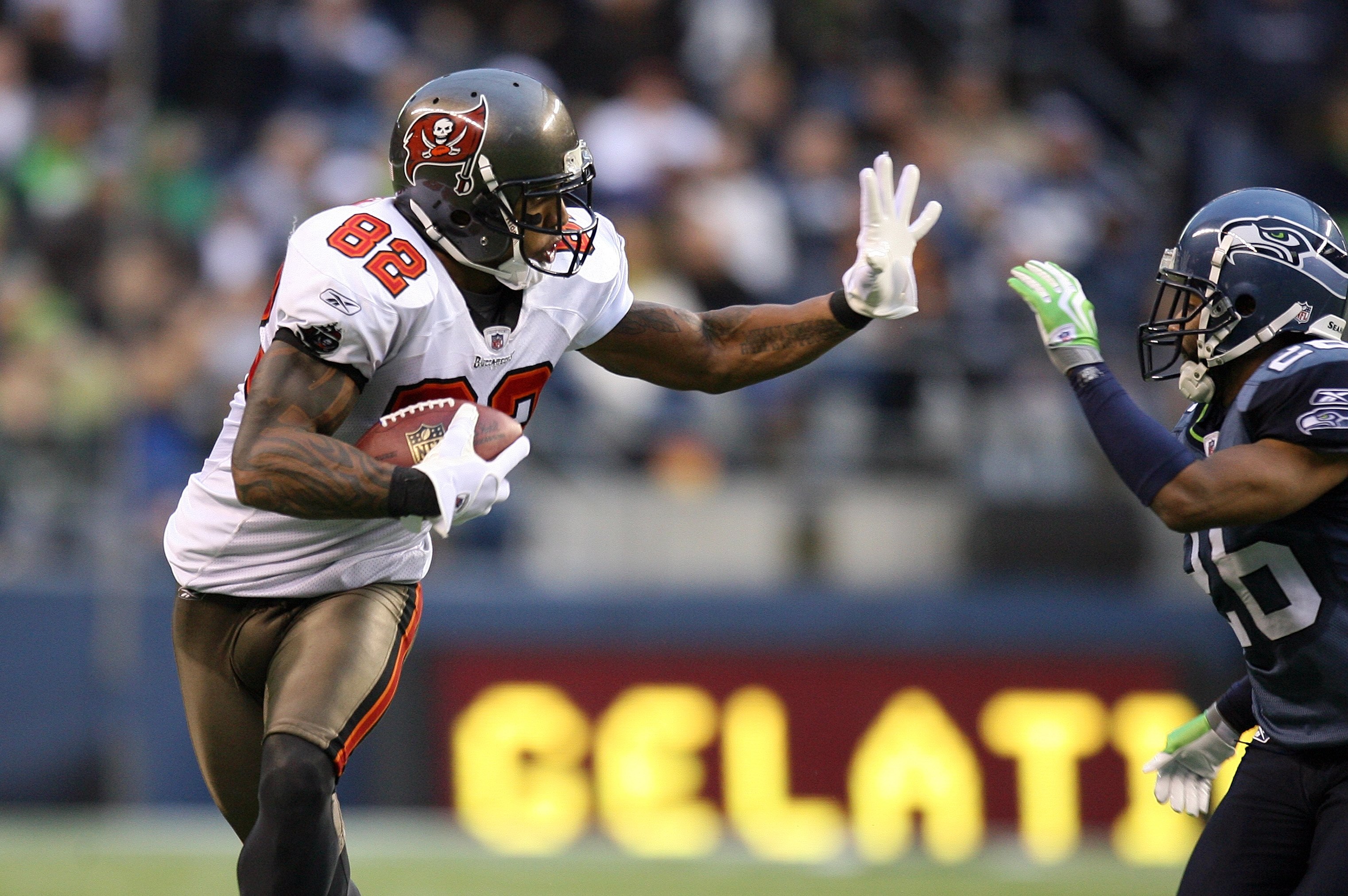 SEATTLE - DECEMBER 20:  Kellen Winslow #82 of the Tampa Bay Buccaneers runs with the ball for yardage during their game against the Seattle Seahawks on December 20, 2009 at Qwest Field in Seattle, Washington. The Buccaneers defeated the Seahawks 24-7. (Ph
