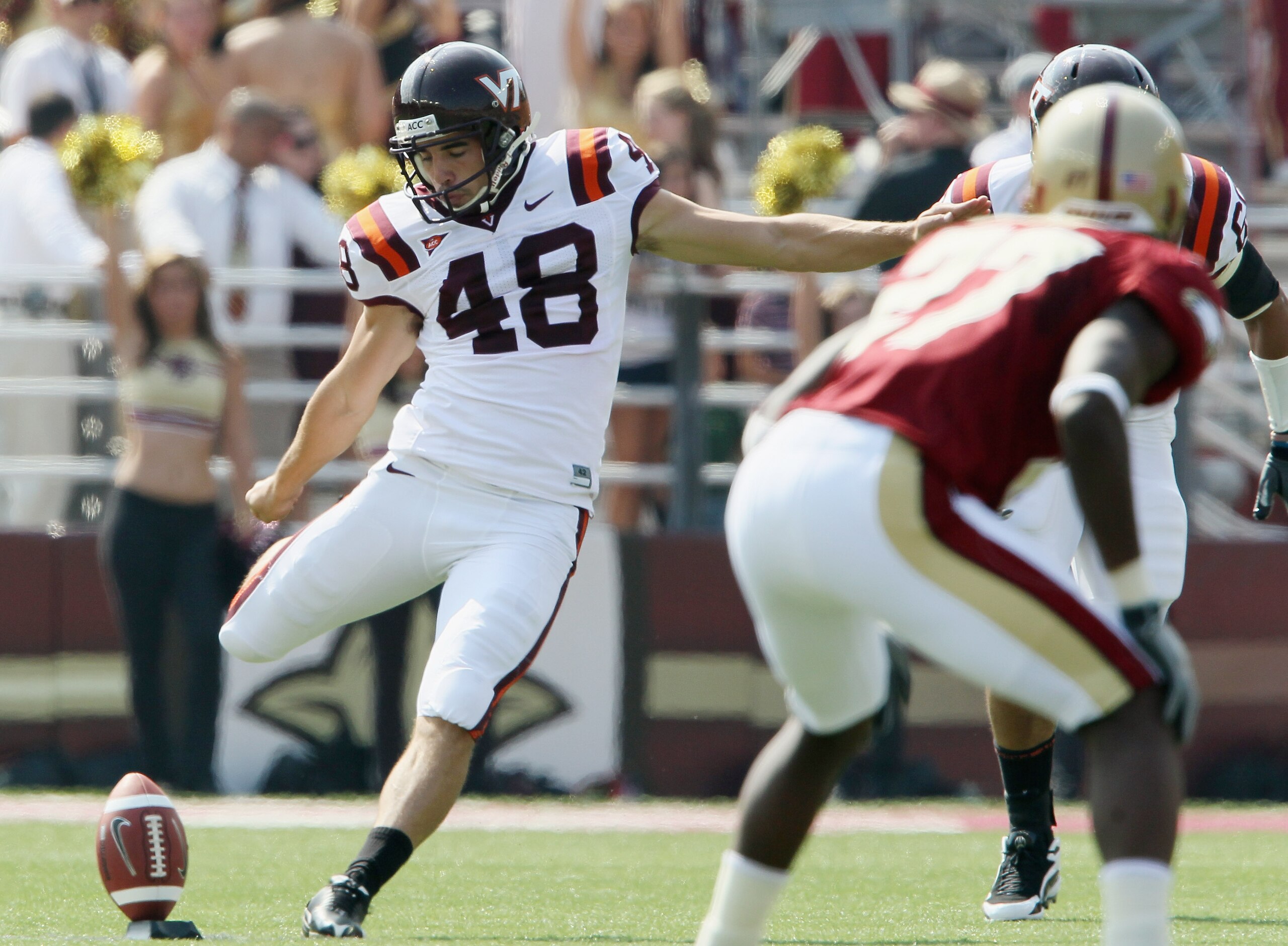 CHESTNUT HILL, MA - SEPTEMBER 25:  Justin Myer #48 of the Virginia Tech Hokies kicks the ball off to start the game against the Boston College Eagles  on September 25, 2010 at Alumni Stadium in Chestnut Hill, Massachusetts.  (Photo by Elsa/Getty Images)