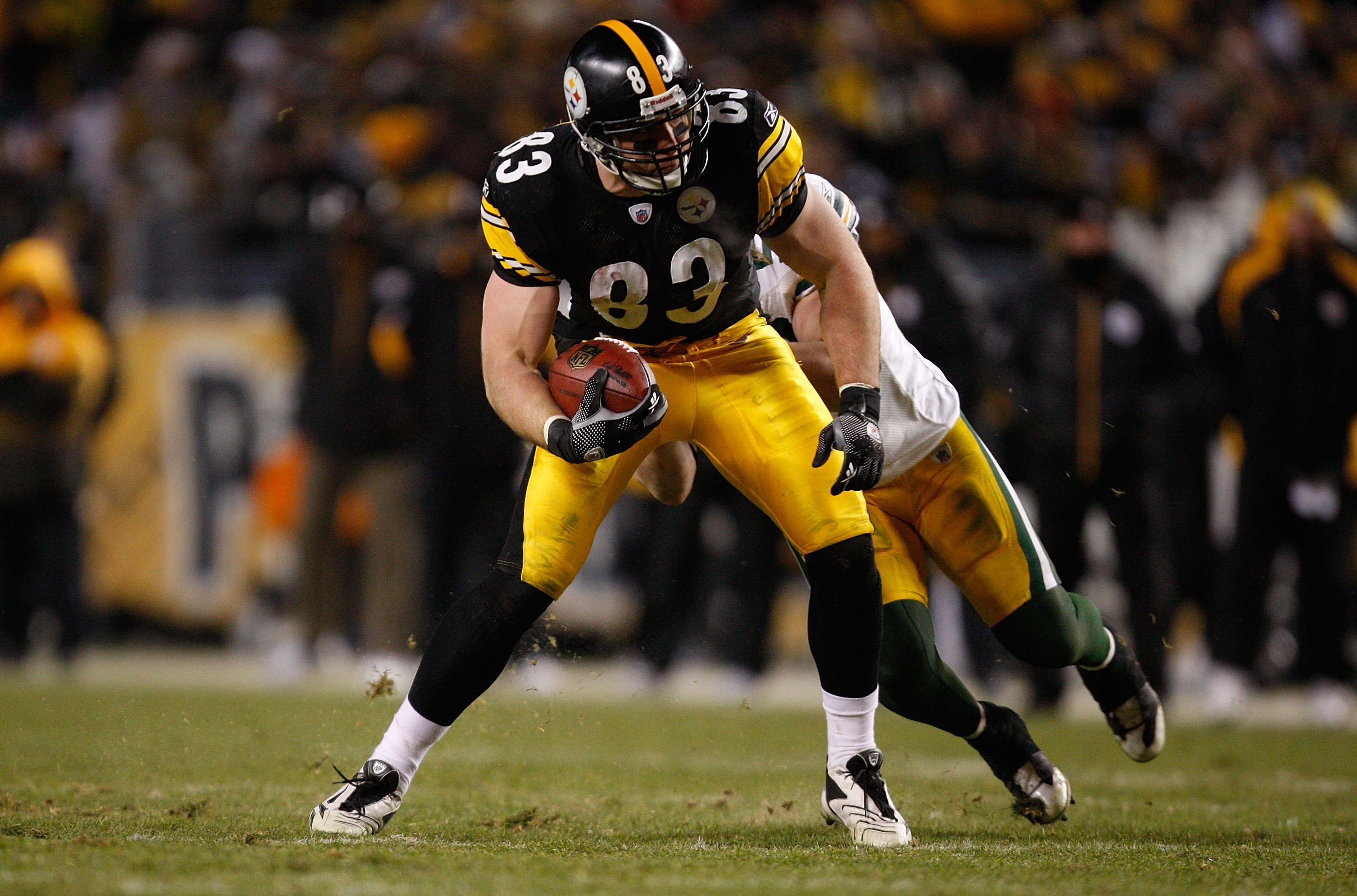 PITTSBURGH - DECEMBER 20: Heath Miller #83 of the Pittsburgh Steelers attempts to break through a tackle by AJ Hawk #50 of the Green Bay Packers during the game on December 20, 2009 at Heinz Field in Pittsburgh, Pennsylvania. (Photo by Jared Wickerham/Get