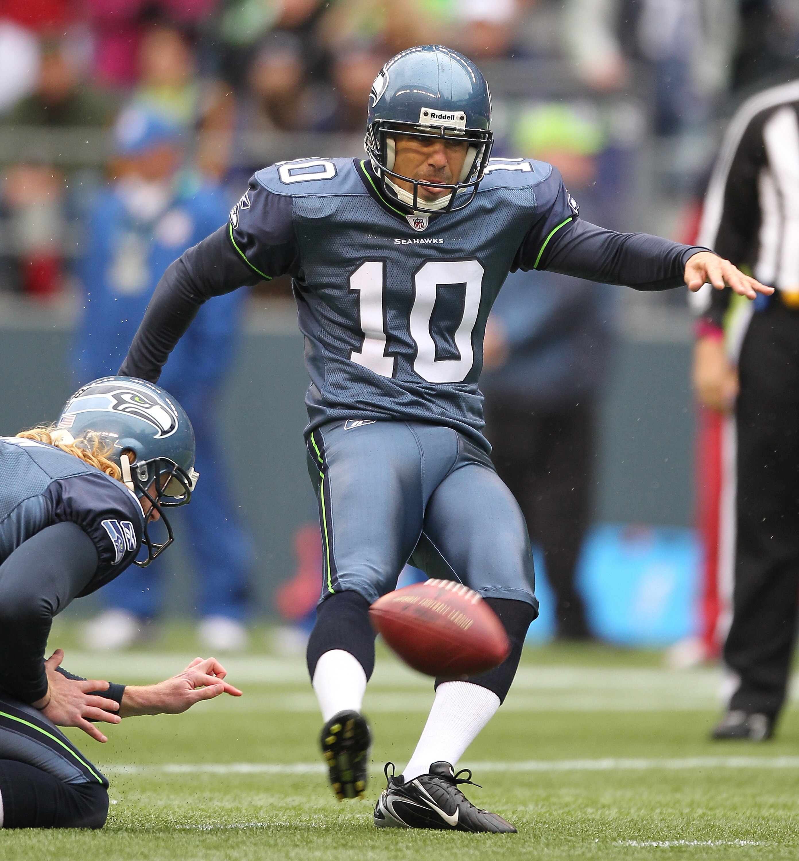 SEATTLE - OCTOBER 24:  Kicker Olindo Mare #10 of the Seattle Seahawks kicks a field goal against the Arizona Cardinals at Qwest Field on October 24, 2010 in Seattle, Washington. The Seahawks defeated the Cardinals 22-10. (Photo by Otto Greule Jr/Getty Ima