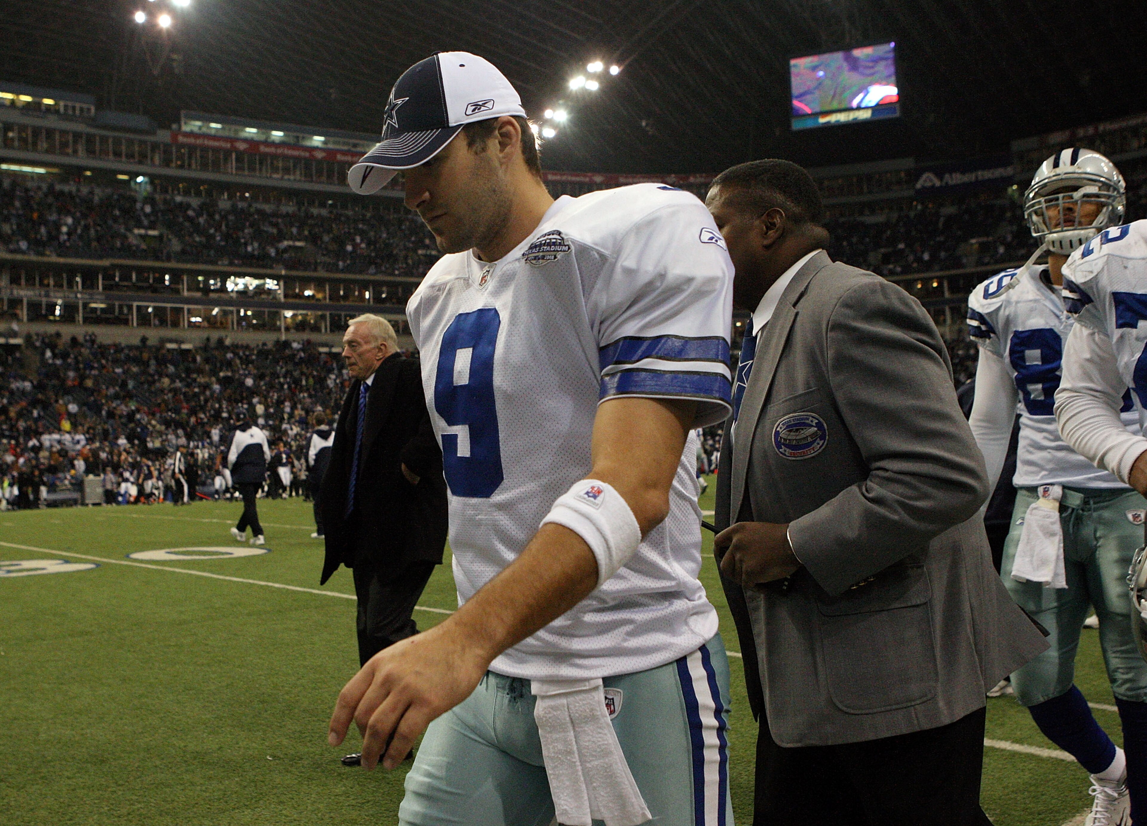 IRVING, TX - DECEMBER 20:  Quarterback Tony Romo #9 of the Dallas Cowboys walks off the field after a 33-24 loss against the Baltimore Ravens at Texas Stadium on December 20, 2008 in Irving, Texas.  The Cowboys are moving to a new stadium next year in Arl