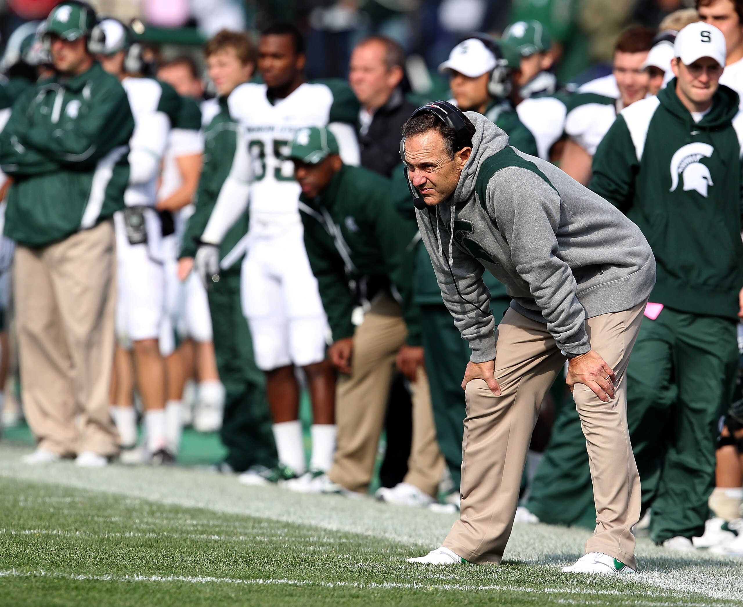 EVANSTON, IL - OCTOBER 23: Head coach Mark Dantonio of the Michigan State Spartans (R) returned to the sidelines for a game against the Northwestern Wildcats at Ryan Field on October 23, 2010 in Evanston, Illinois. Michigan State defeated Northwestern 35-