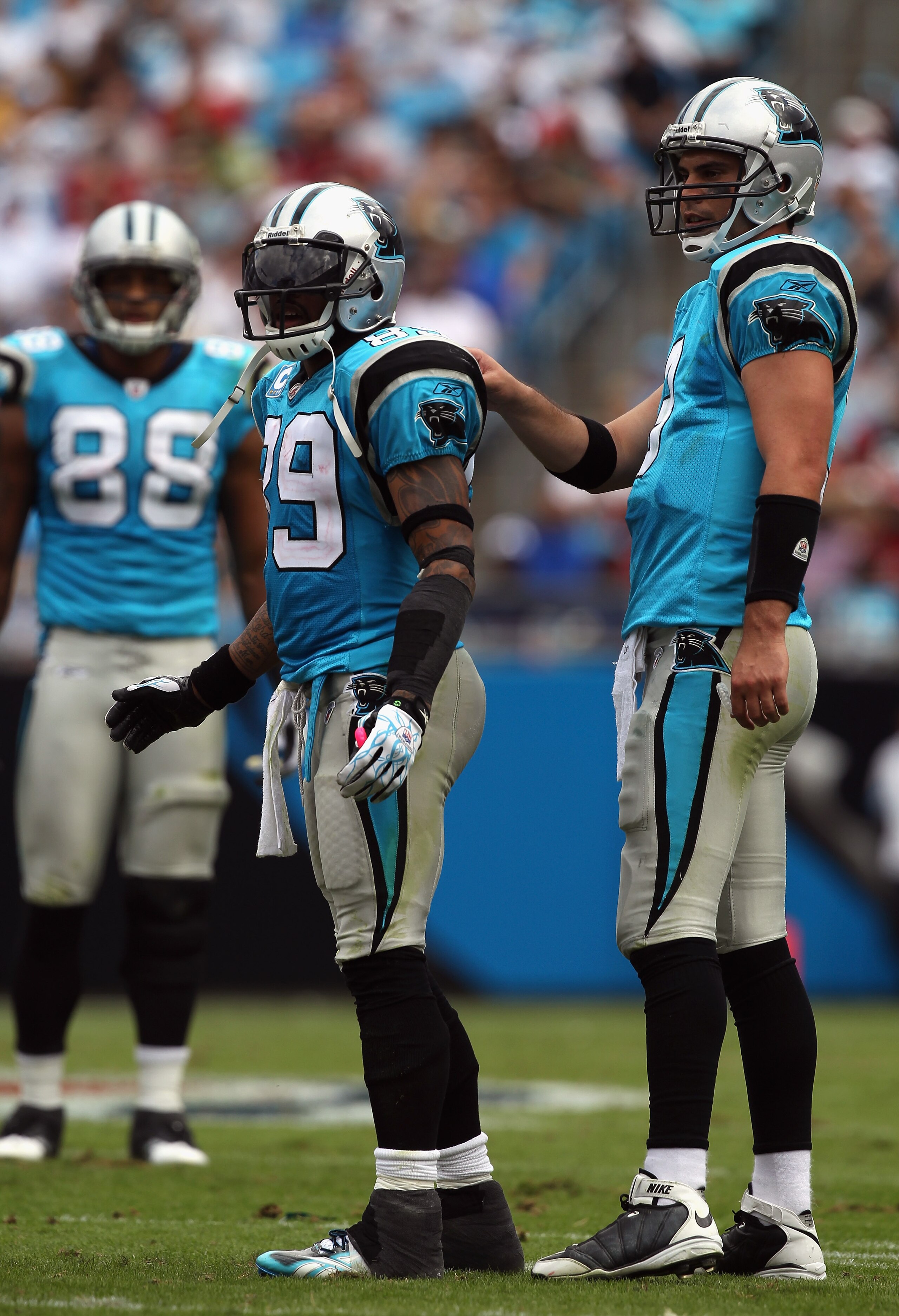 CHARLOTTE, NC - OCTOBER 24:  Matt Moore #3 of the Carolina Panthers holds back teammate Steve Smith #89 against the San Francisco 49ers during their game at Bank of America Stadium on October 24, 2010 in Charlotte, North Carolina.  (Photo by Streeter Leck