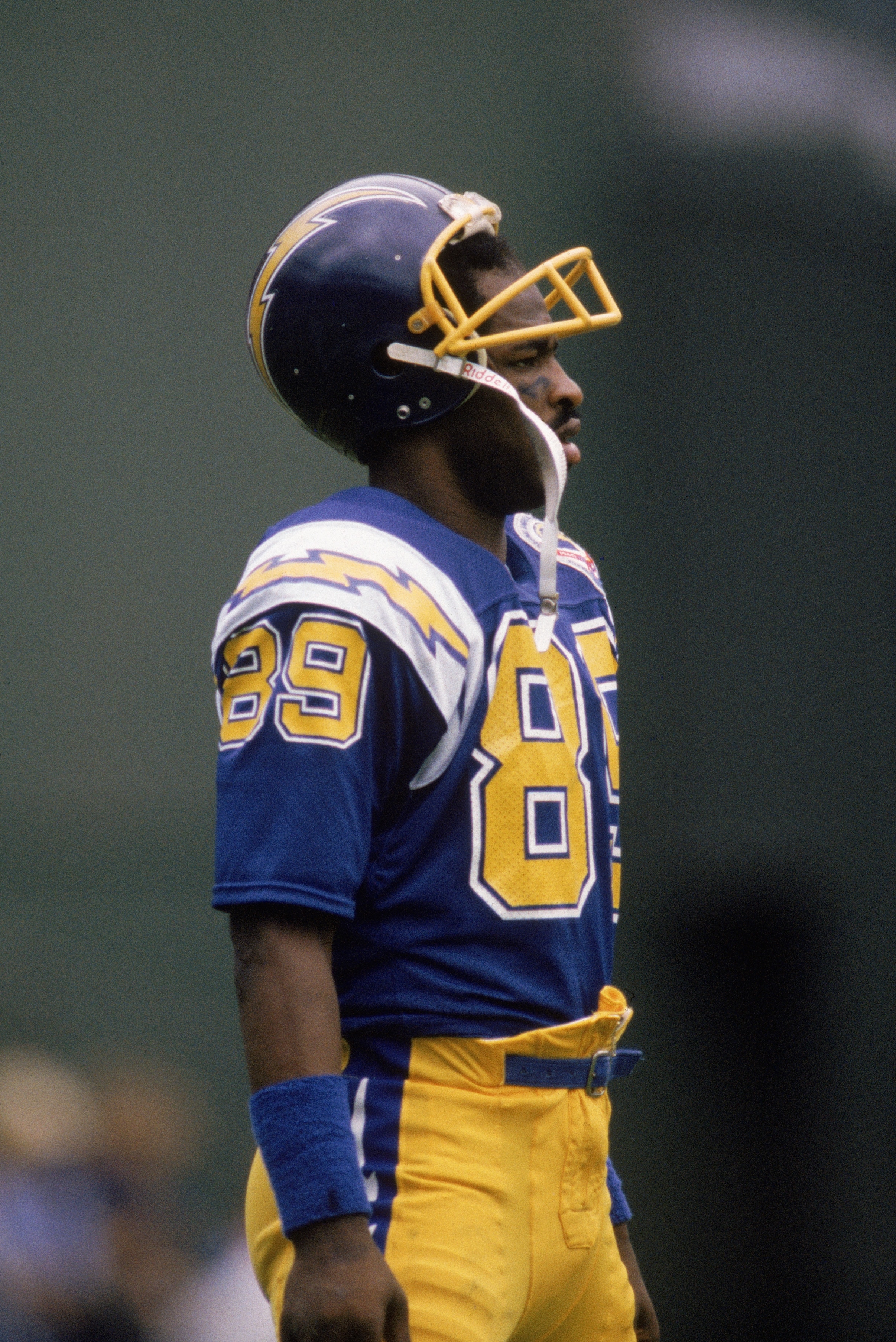 1987:  Wide receiver Wes Chandler #89 of the San Diego Chargers stands with helmet removed during a 1987 NFL game.  (Photo by Tony Duffy/Getty Images)