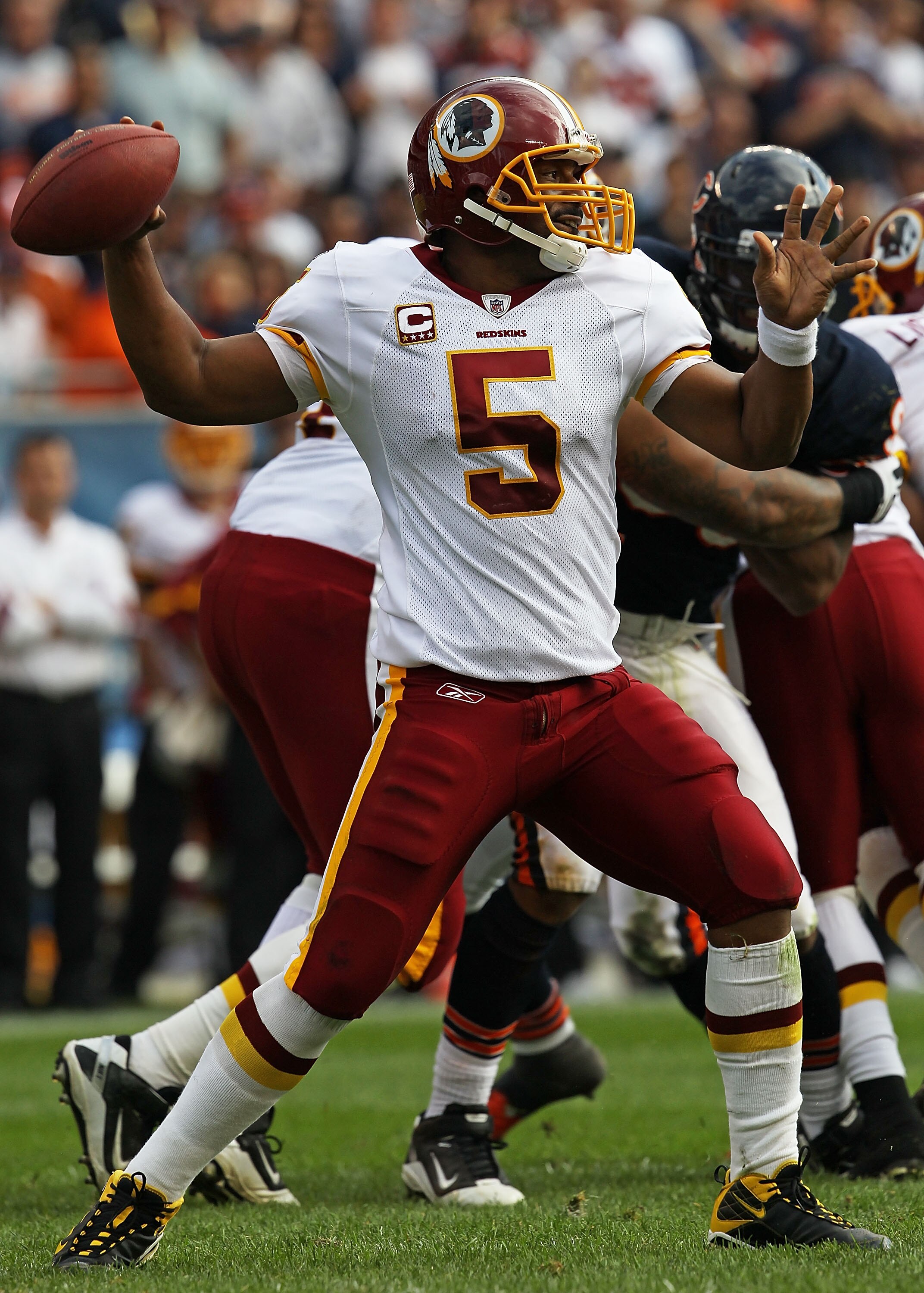 CHICAGO - OCTOBER 24: Donovan McNabb #5 of the Washington Redskins throws a pass against the Chicago Bears at Soldier Field on October 24, 2010 in Chicago, Illinois. The Redskins defeated the Bears 17-14. (Photo by Jonathan Daniel/Getty Images)