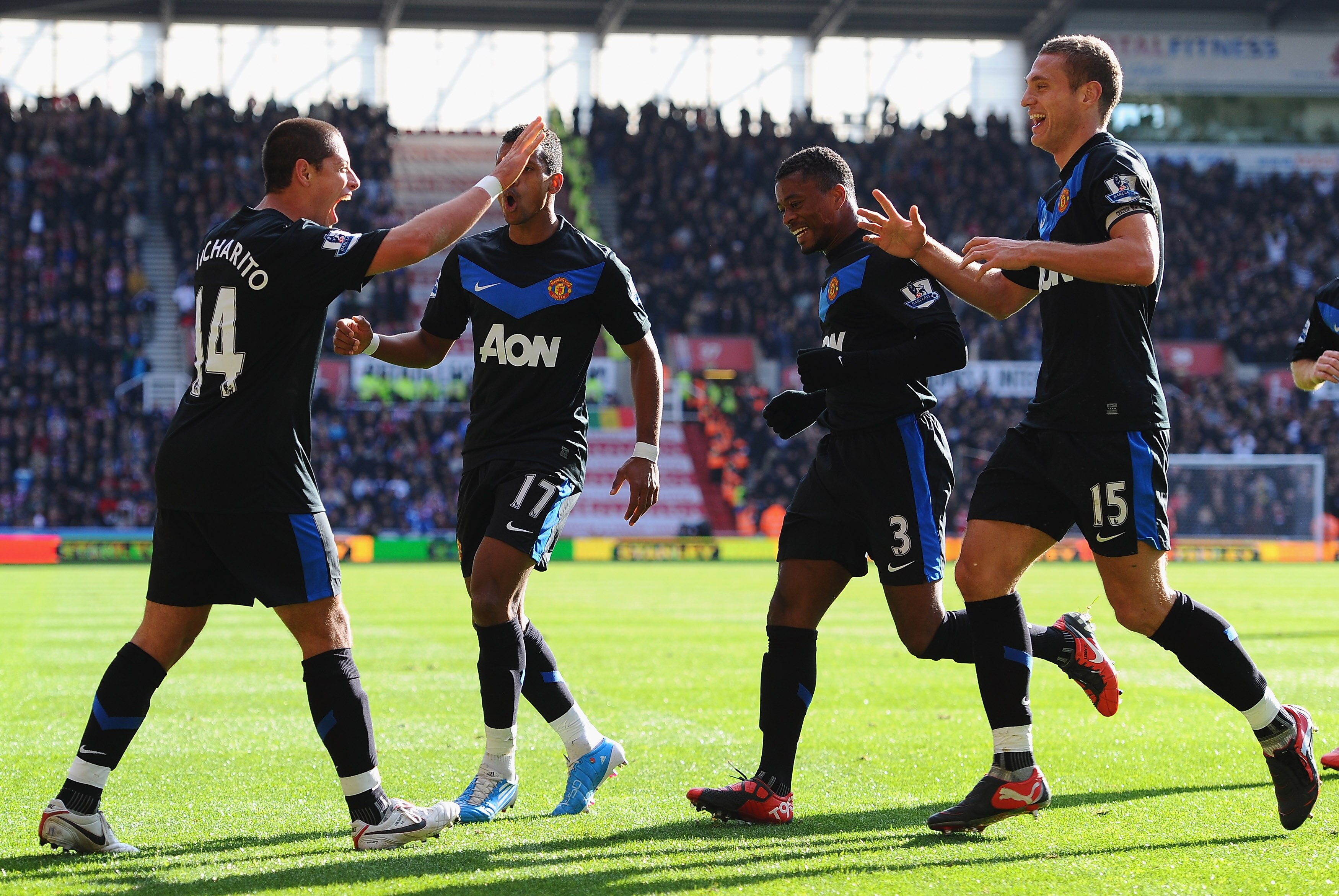 STOKE ON TRENT, ENGLAND - OCTOBER 24: Javier Hernandez of Manchester United is congratulated by team mates Nani, Patrice Evra and Nemanja Vidic after scoring during the Barclays Premier League match between Stoke City and Manchester United at Britannia S STOKE ON TRENT, ENGLAND - OCTOBER 24: Javier Hernandez of Manchester United is congratulated by team mates Nani, Patrice Evra and Nemanja Vidic after scoring during the Barclays Premier League match between Stoke City and Manchester United at Britannia S