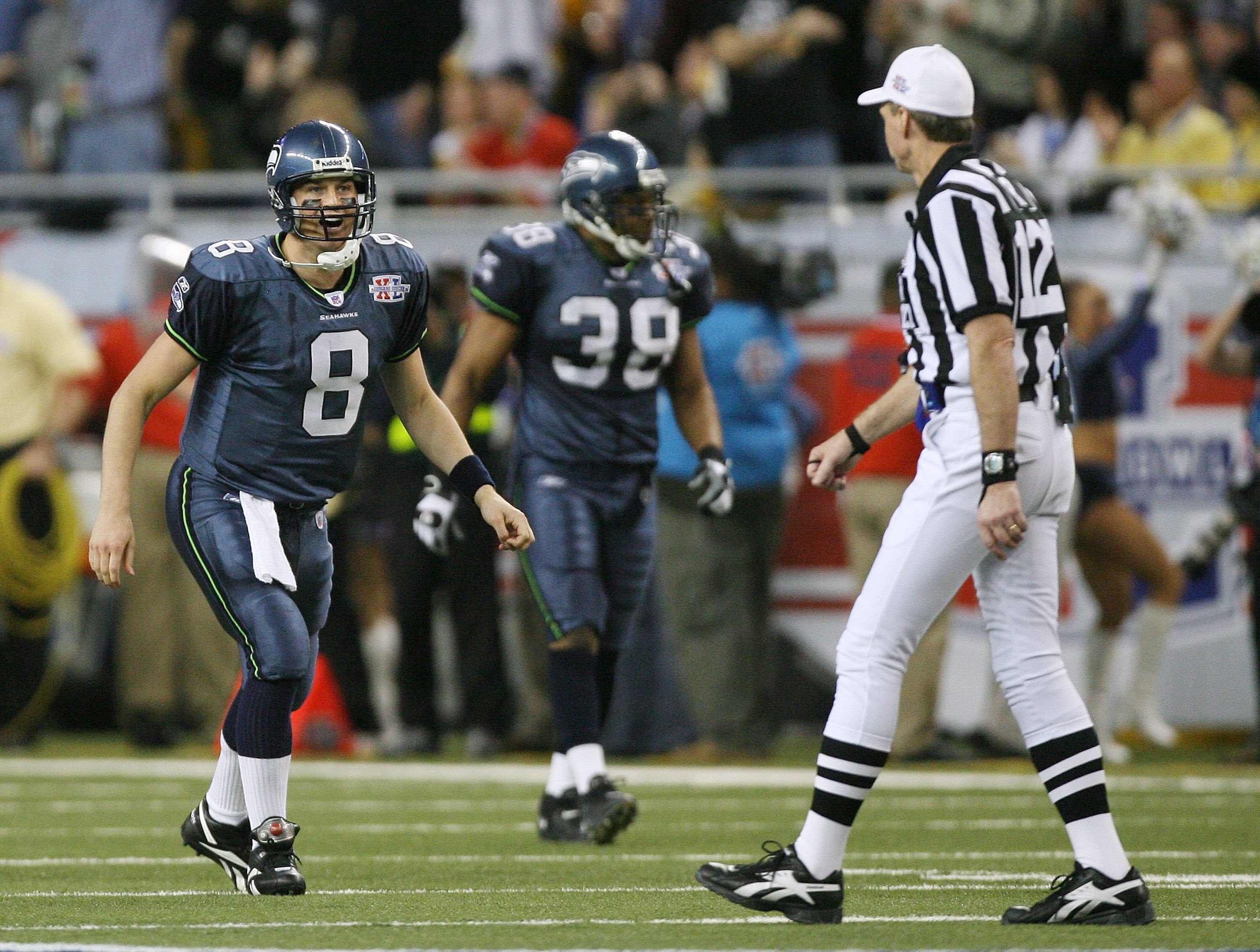 DETROIT - FEBRUARY 05:  Quarterback Matt Hasselbeck #8 of the Seattle Seahawks argues a call with referee Bill Leavy after throwing a pass out of bounds to receiver Darrell Jackson #82 in the second quarter against the Pittsburgh Steelers in Super Bowl XL