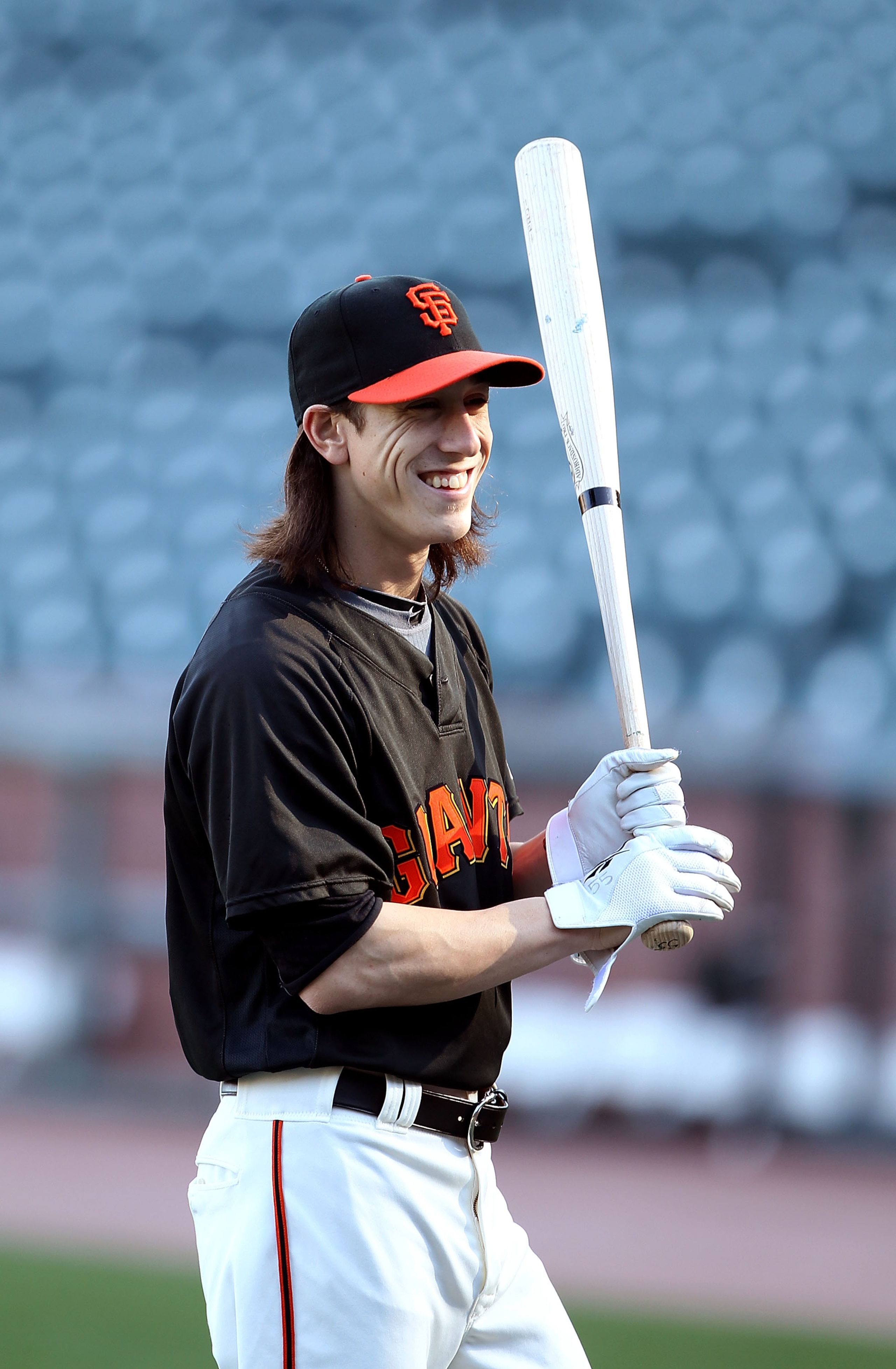 SAN FRANCISCO - OCTOBER 18:  Tim Lincecum #55 of the San Francisco Giants takes batting practice during a workout session for the NLCS at AT&T Park on October 18, 2010 in San Francisco, California.  (Photo by Ezra Shaw/Getty Images)