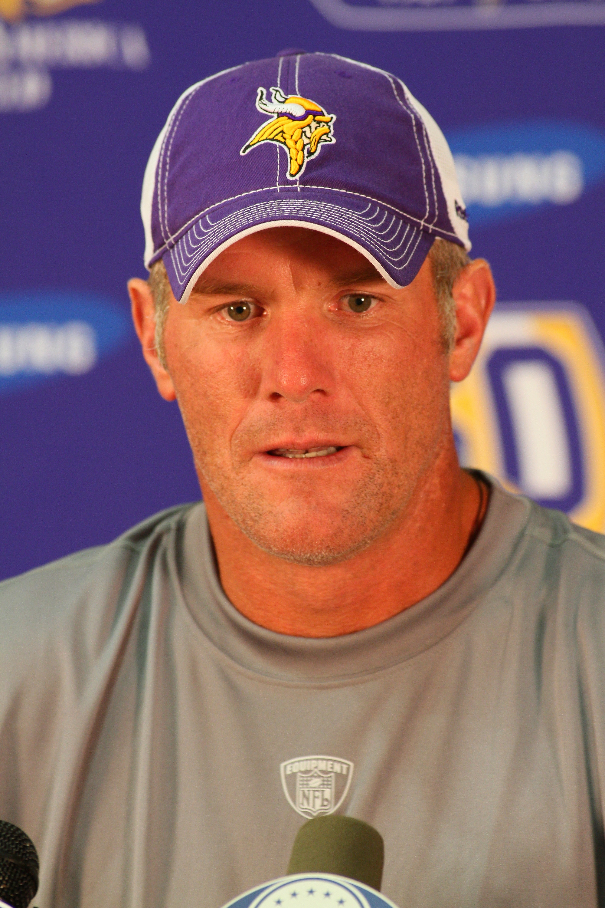 EDEN PRAIRIE, MN - AUGUST 18: Minnesota Vikings quarterback Brett Favre addresses the media at a press conference after the first morning practice since returning to Vikings Winter Park on August 18, 2010 in Eden Prairie, Minnesota. Favre injured his ankl