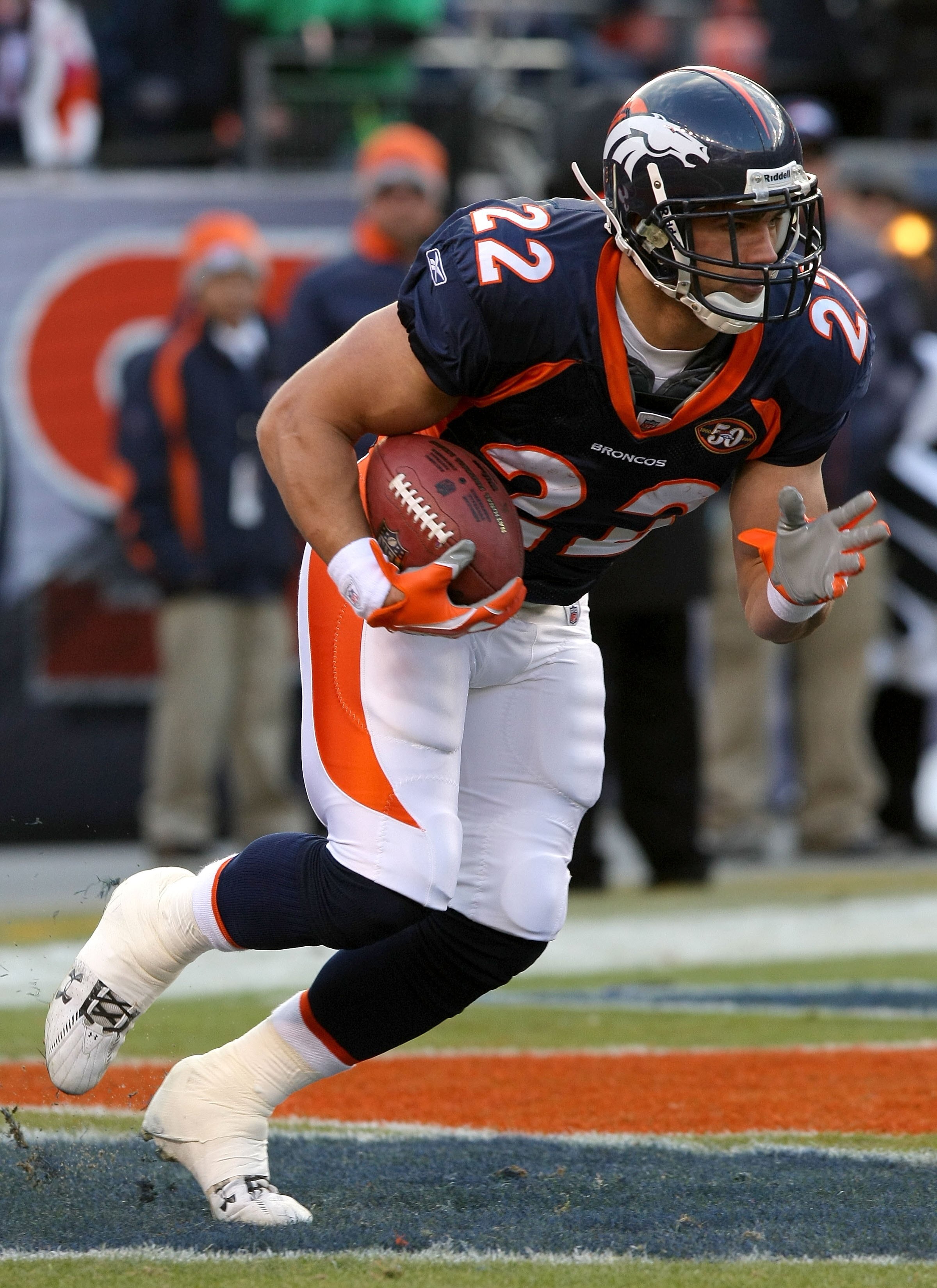 DENVER - JANUARY 03:  Peyton Hillis #22 of the Denver Broncos returns a kick off against the Kansas City Chiefs during NFL action at Invesco Field at Mile High on January 3, 2010 in Denver, Colorado. The Chiefs defeated the Broncos 44-24.  (Photo by Doug