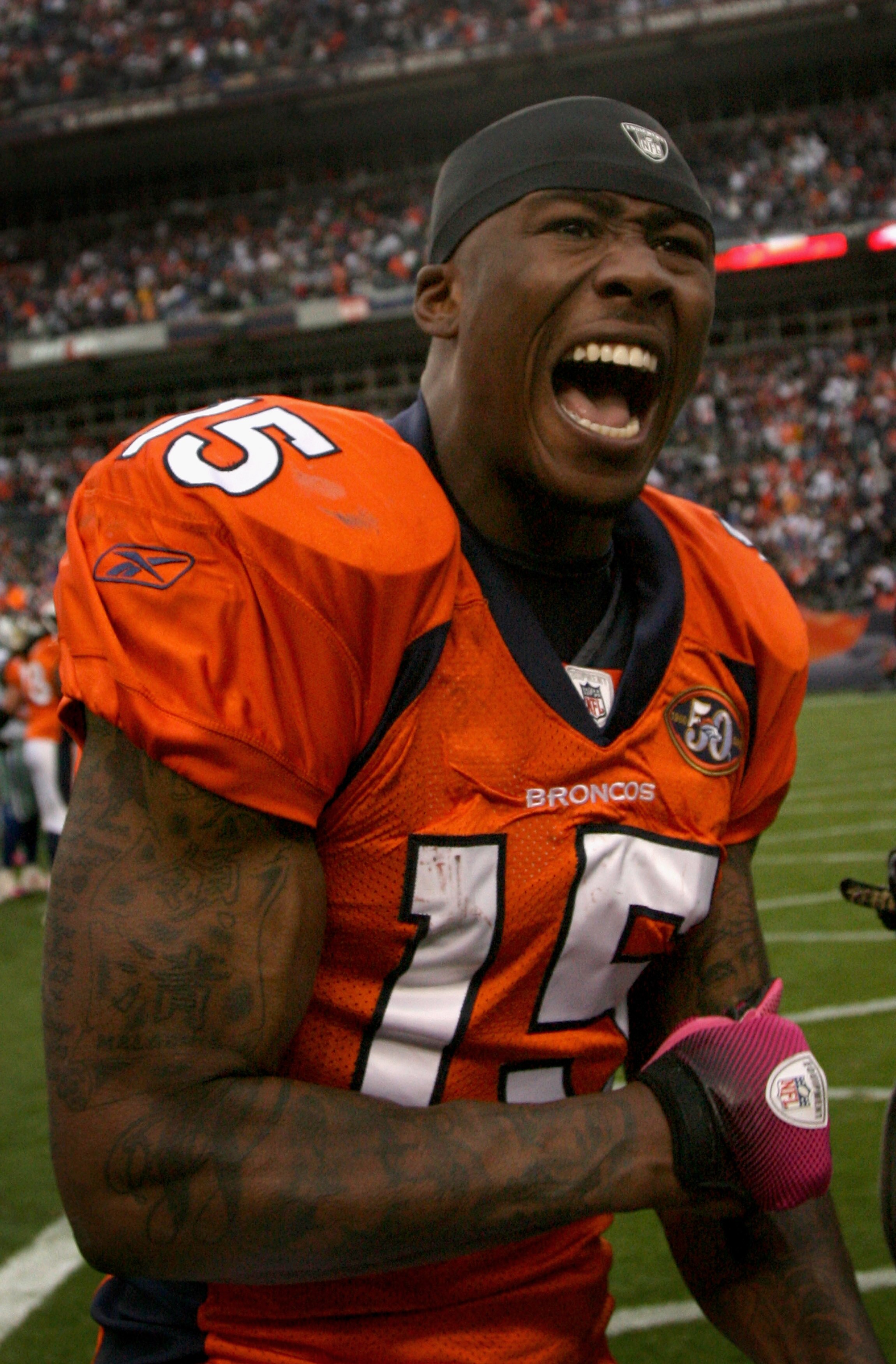 DENVER - OCTOBER 04:  Brandon Marshall #15 of the Denver Broncos celebrates after the final play against the Dallas Cowboys during NFL action at Invesco Field at Mile High on October 4, 2009 in Denver, Colorado. Marshall caught the game winning 51 yard to