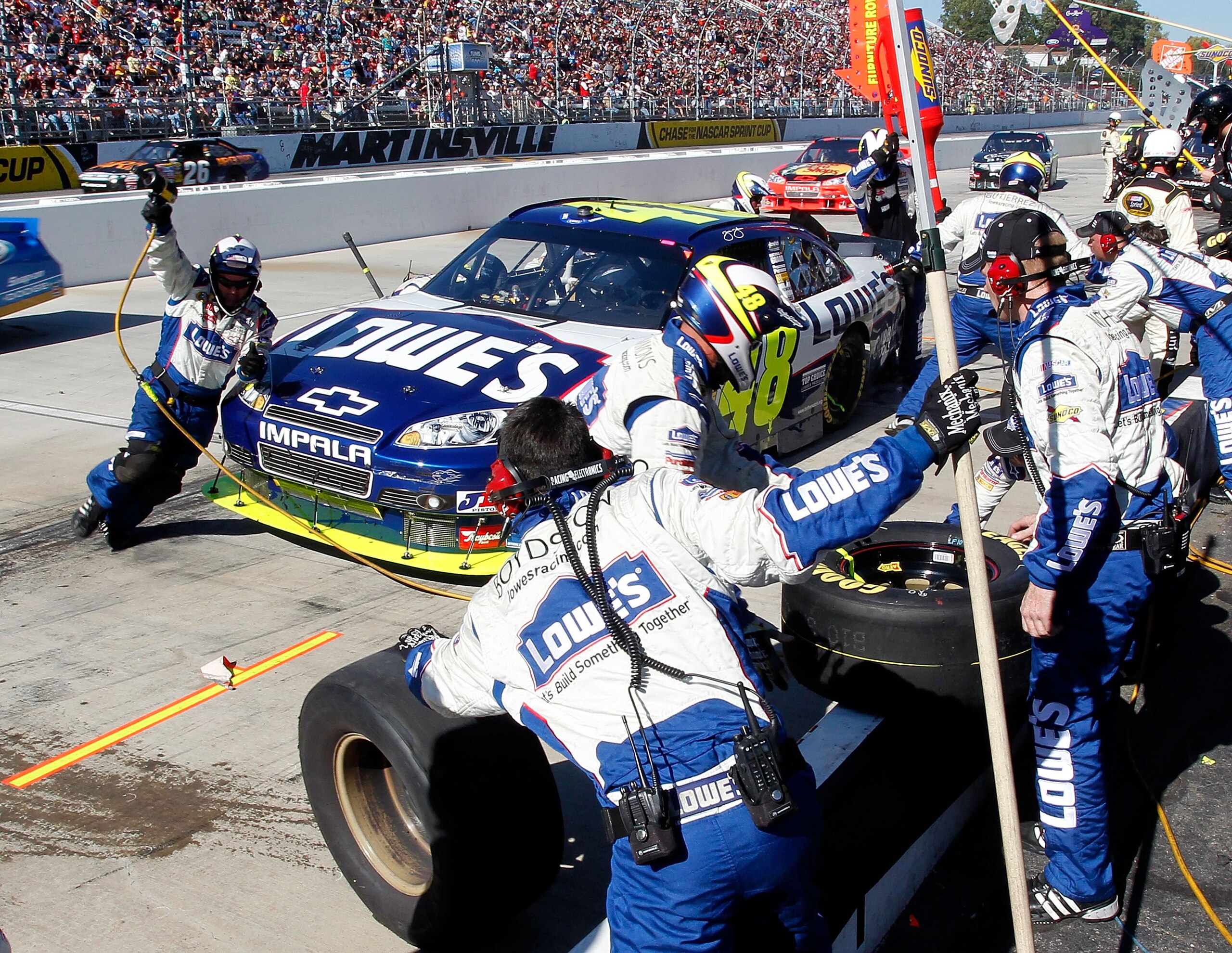 MARTINSVILLE, VA - OCTOBER 24: Jimmie Johnson, driver of the #48 Lowe's Chevrolet, pits during the NASCAR Sprint Cup Series TUMS Fast Relief 500 at Martinsville Speedway on October 24, 2010 in Martinsville, Virginia.  (Photo by Geoff Burke/Getty Images fo