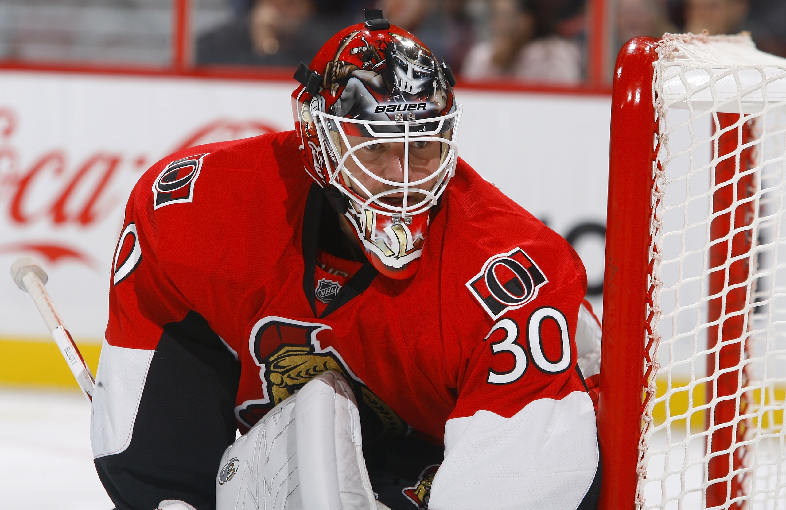 OTTAWA, ON - OCTOBER 14:  Brian Elliott #30 of the Ottawa Senators follows the play behind the net during a game against the Carolina Hurricanes at Scotiabank Place on October 14, 2010 in Ottawa, Ontario, Canada.  The Ottawa Senators defeated the Carolina