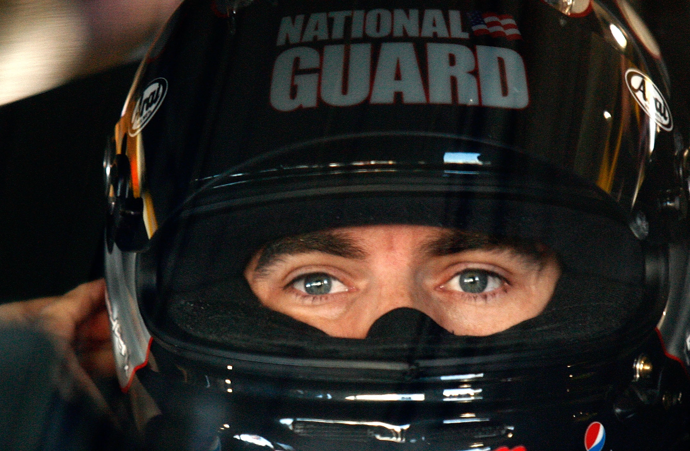 MARTINSVILLE, VA - OCTOBER 23:  Jeff Gordon, driver of the #24 DuPont/National Guard Families Chevrolet, sits in his car during practice for the NASCAR Sprint Cup Series TUMS Fast Relief 500 at Martinsville Speedway on October 23, 2010 in Martinsville, Vi