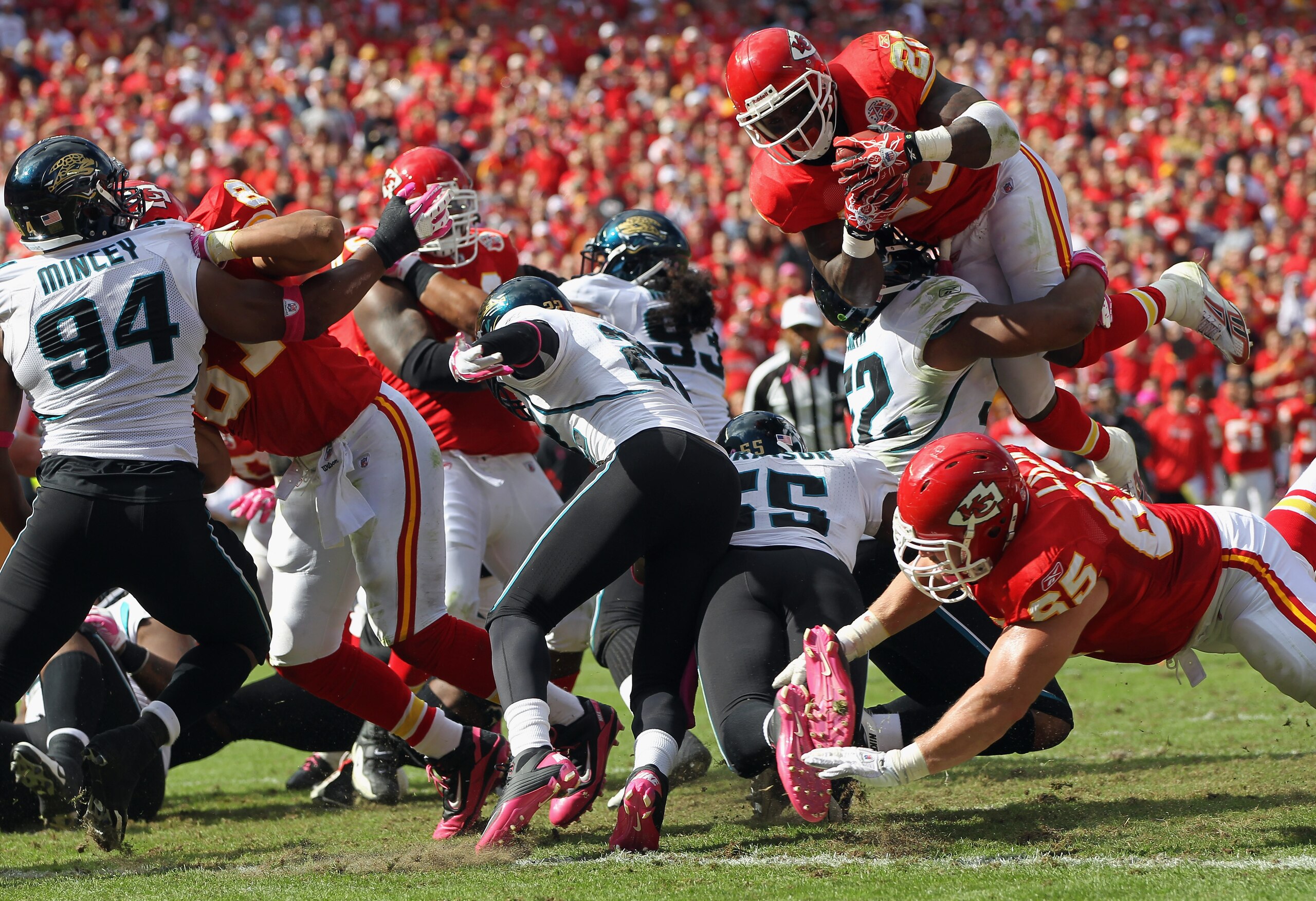 KANSAS CITY, MO - OCTOBER 24:   Running back Thomas Jones #20 of the Kansas City Chiefs carries the ball up and over while trying to score during the game against the Jacksonville Jaguars on October 24, 2010 at Arrowhead Stadium in Kansas City, Missouri. 