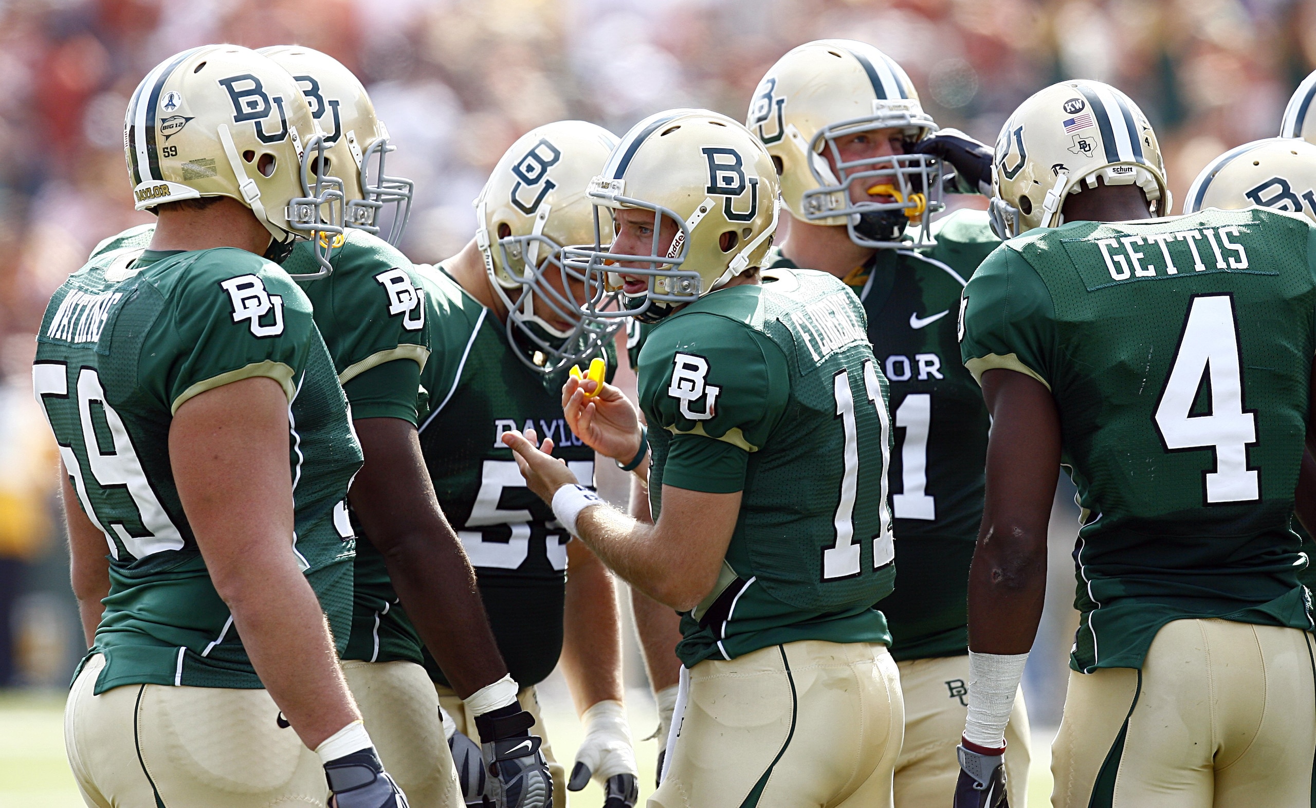 WACO, TX - NOVEMBER 14: Quarterback Nick Florence #11 of the Baylor Bears leads his team in the huddle against the Texas Longhorns in the second half on November 14, 2009 at Floyd Casey Stadium in Waco, Texas. (Photo by Tom Pennington/Getty Images) WACO, TX - NOVEMBER 14: Quarterback Nick Florence #11 of the Baylor Bears leads his team in the huddle against the Texas Longhorns in the second half on November 14, 2009 at Floyd Casey Stadium in Waco, Texas. (Photo by Tom Pennington/Getty Images)