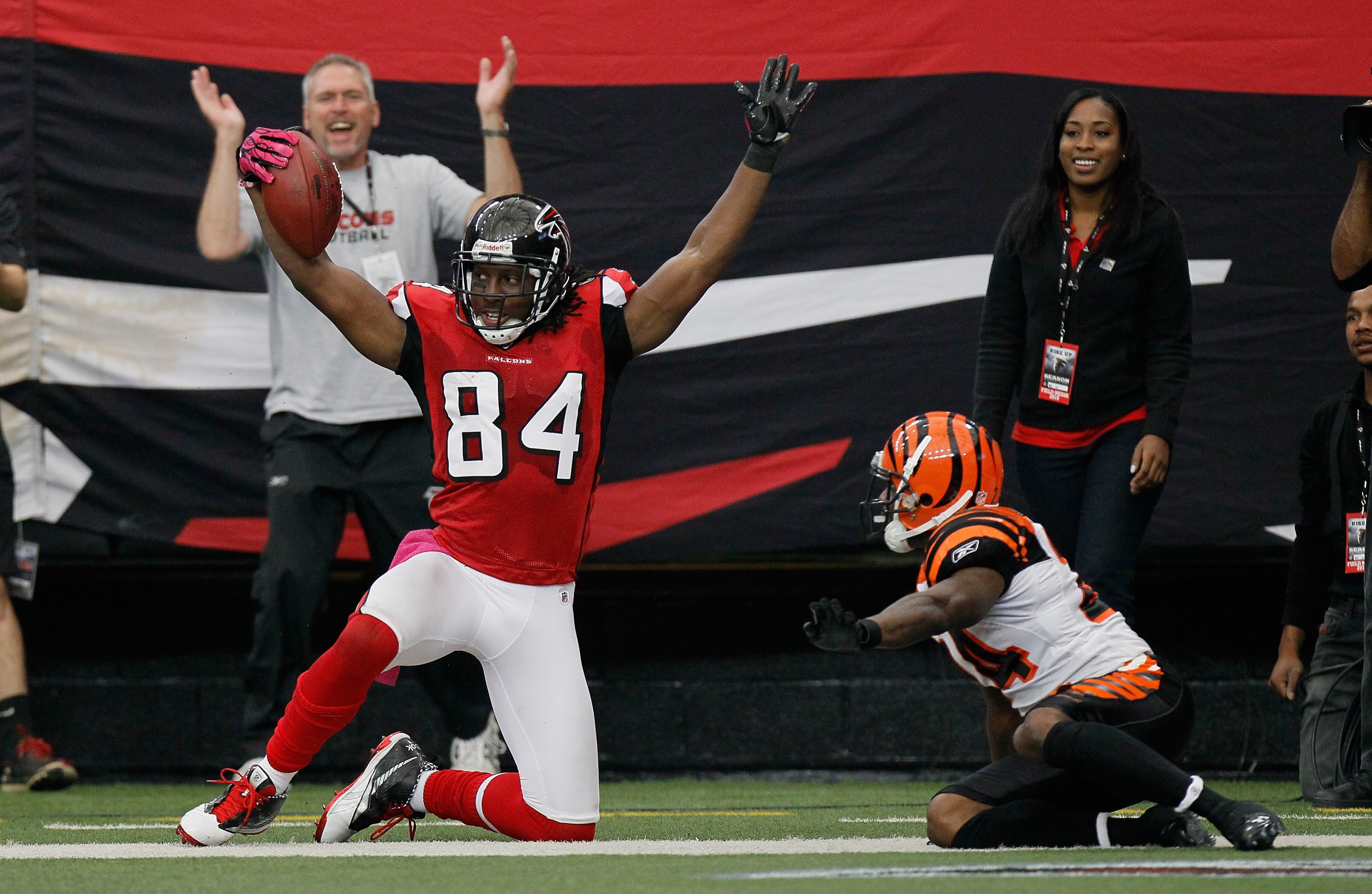 ATLANTA - OCTOBER 24:  Roddy White #84 of the Atlanta Falcons reacts after scoring a touchdown against Adam Jones #24 of the Cincinnati Bengals at Georgia Dome on October 24, 2010 in Atlanta, Georgia.  (Photo by Kevin C. Cox/Getty Images)