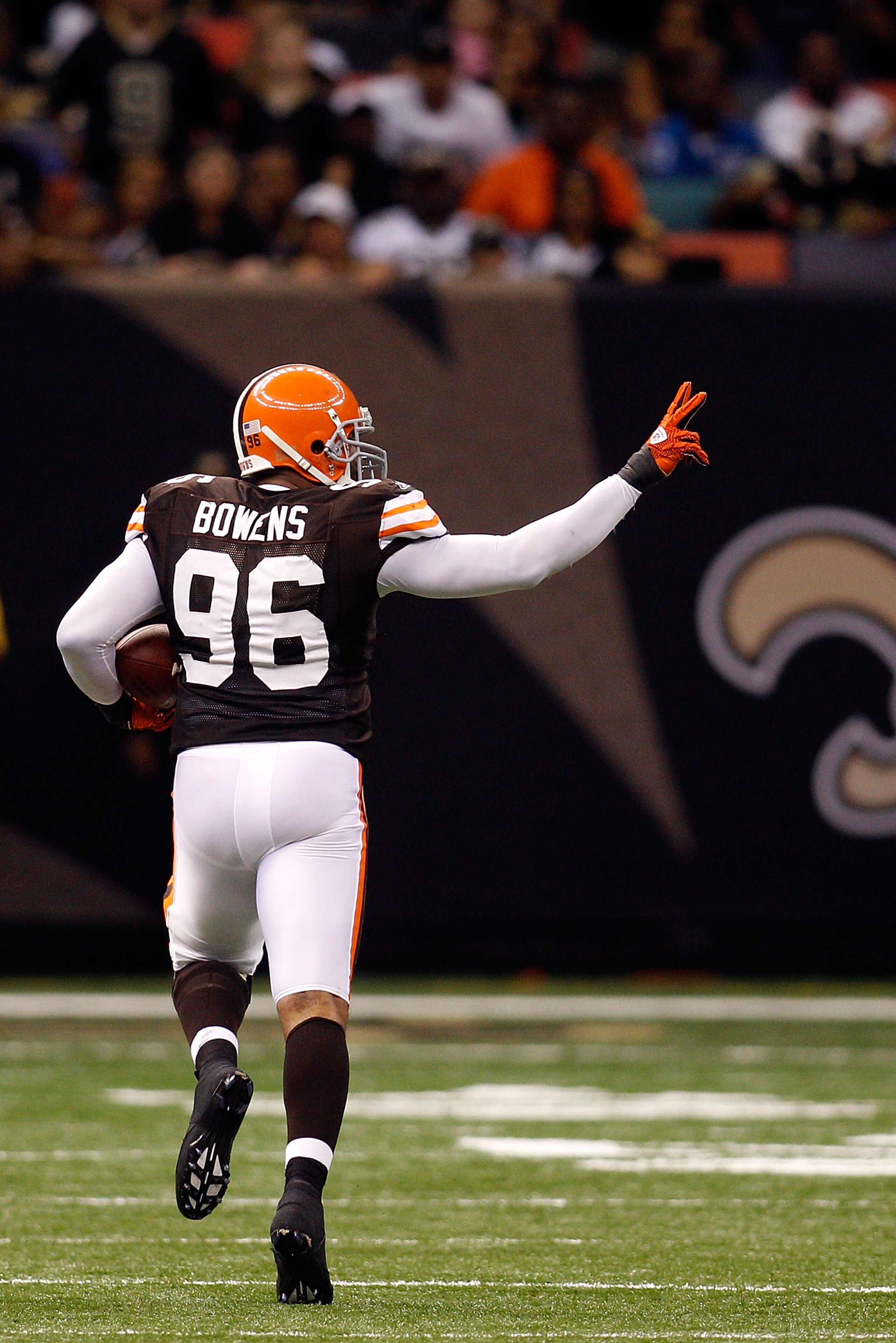 NEW ORLEANS - OCTOBER 24:  David Bowens #96 of the Cleveland Browns returns his second interception of the day for a touchdown against the New Orleans Saints at the Louisiana Superdome on October 24, 2010 in New Orleans, Louisiana.  (Photo by Chris Grayth