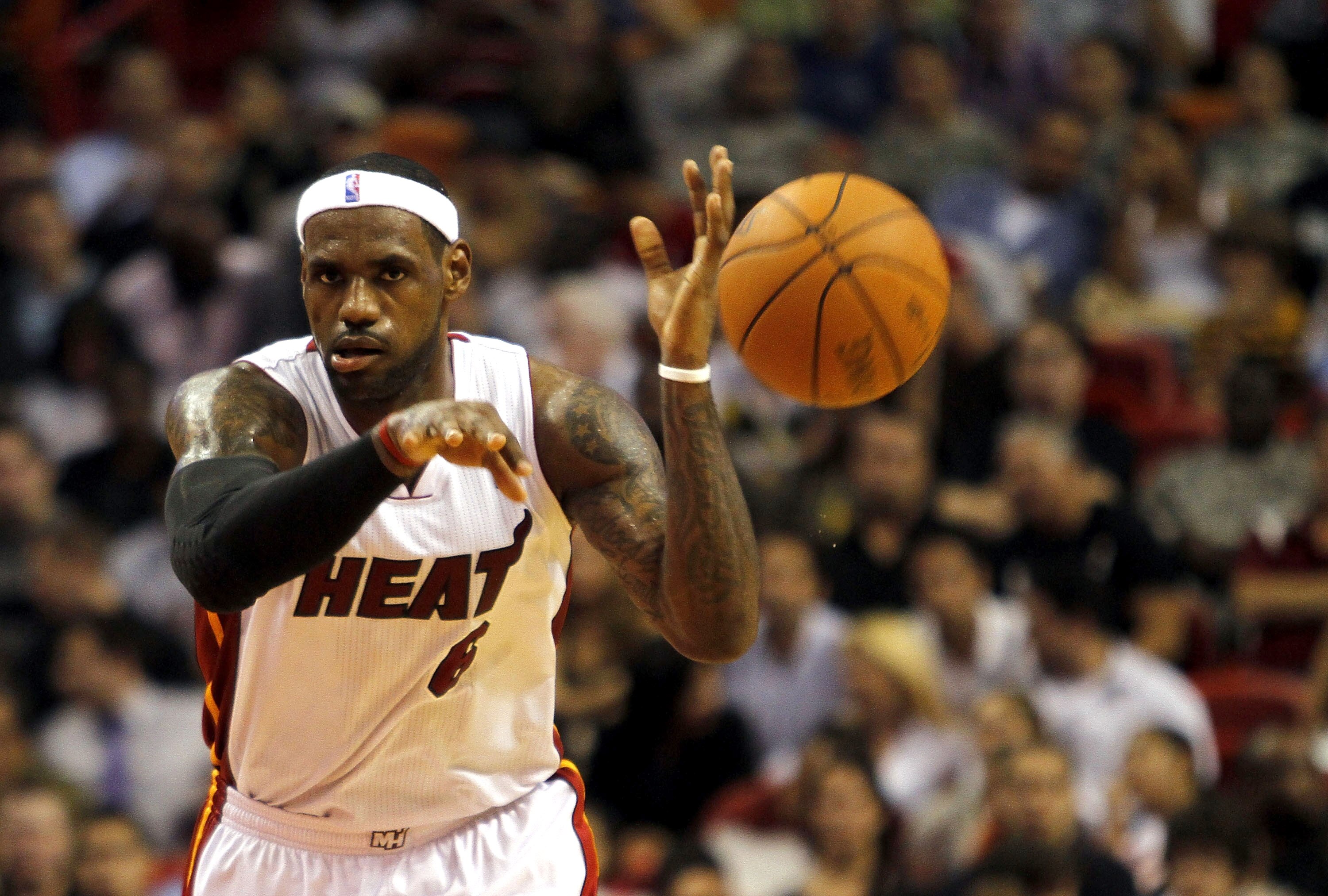 MIAMI - OCTOBER 12:  Forward LeBron James #6 of the Miami Heat passes against CSKA Moskow on October 12, 2010 in Miami, Florida.  NOTE TO USER: User expressly acknowledges and agrees that, by downloading and or using this photograph, User is consenting to