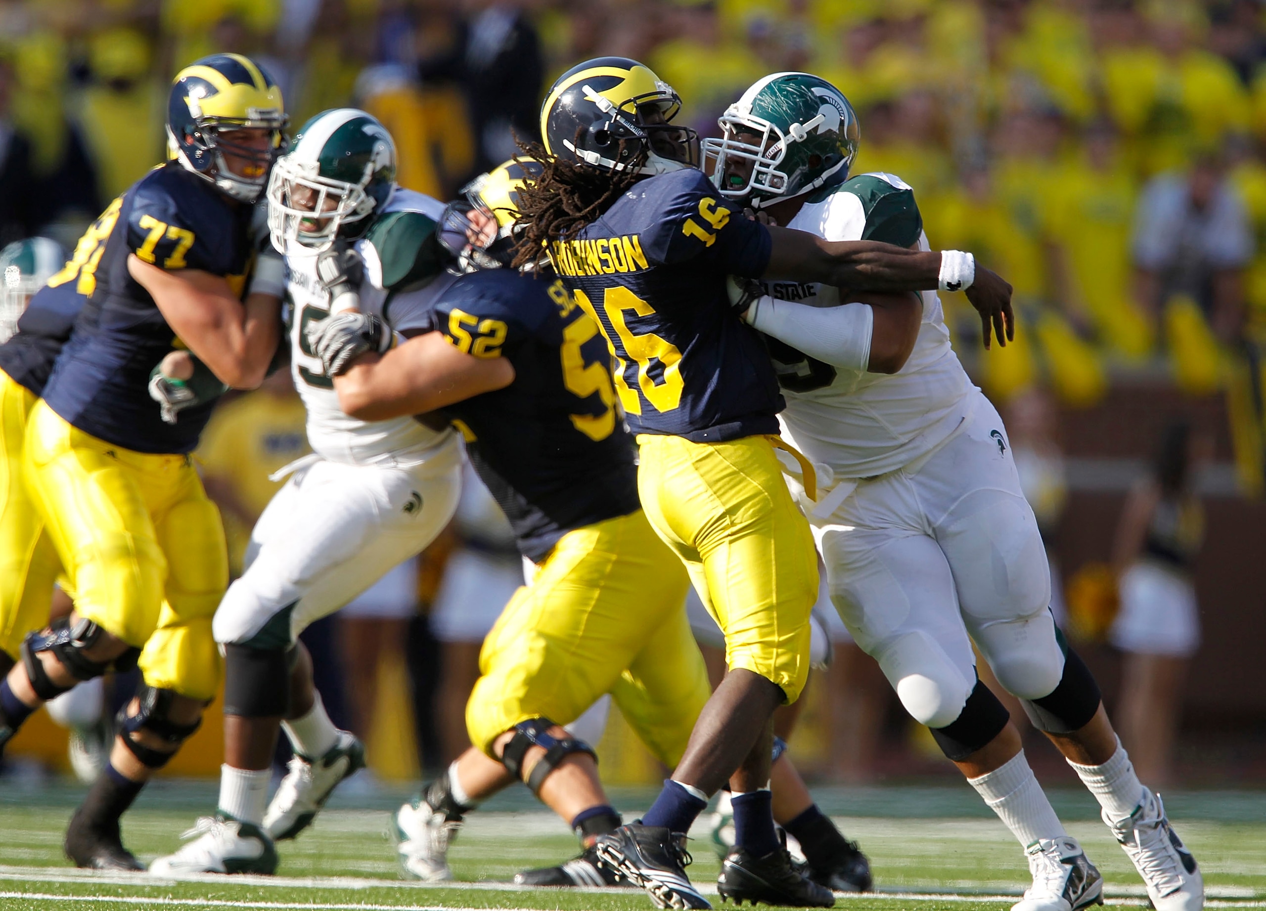 ANN ARBOR, MI - OCTOBER 09:  Jerel Worthy #99 of the Michigan State Spartans rushes Denard Robinson #16 of the Michigan Wolverines during the game on October 9, 2010 at Michigan Stadium in Ann Arbor, Michigan. The Michigan State Spartans defeated the Mich