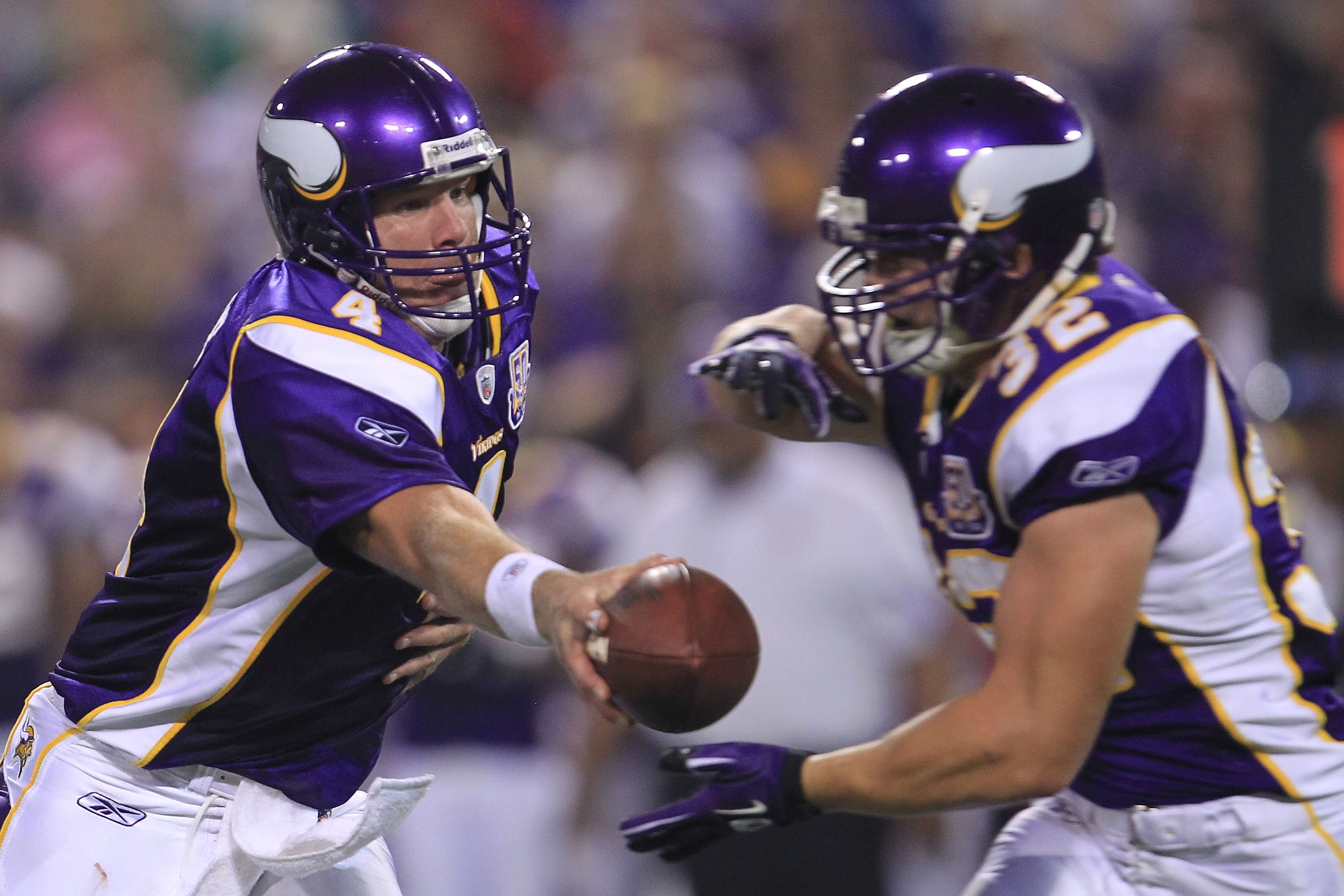 MINNEAPOLIS - AUGUST 28:  Brett Favre #4 of the Minnesota Vikings hands off to Toby Gerhart #32 against the Seattle Seahawks during a preseason NFL game at Mall of America Field at the Hubert H. Humphrey Metrodome on August 28, 2010  in Minneapolis, Minne