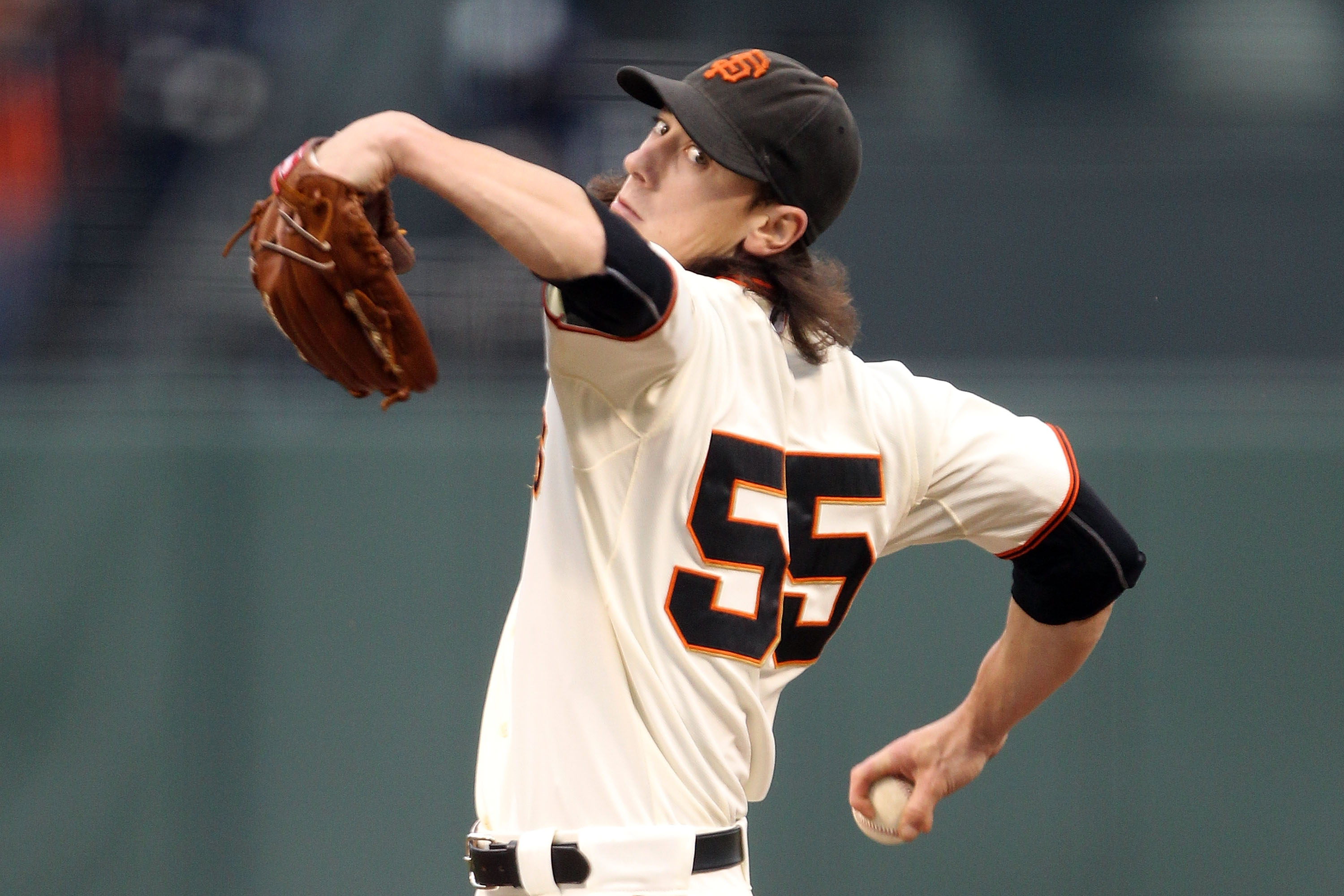SAN FRANCISCO - OCTOBER 21:  Tim Lincecum #55 of the San Francisco Giants pitches in the first inning against the Philadelphia Phillies in Game Five of the NLCS during the 2010 MLB Playoffs at AT&T Park on October 21, 2010 in San Francisco, California.  (