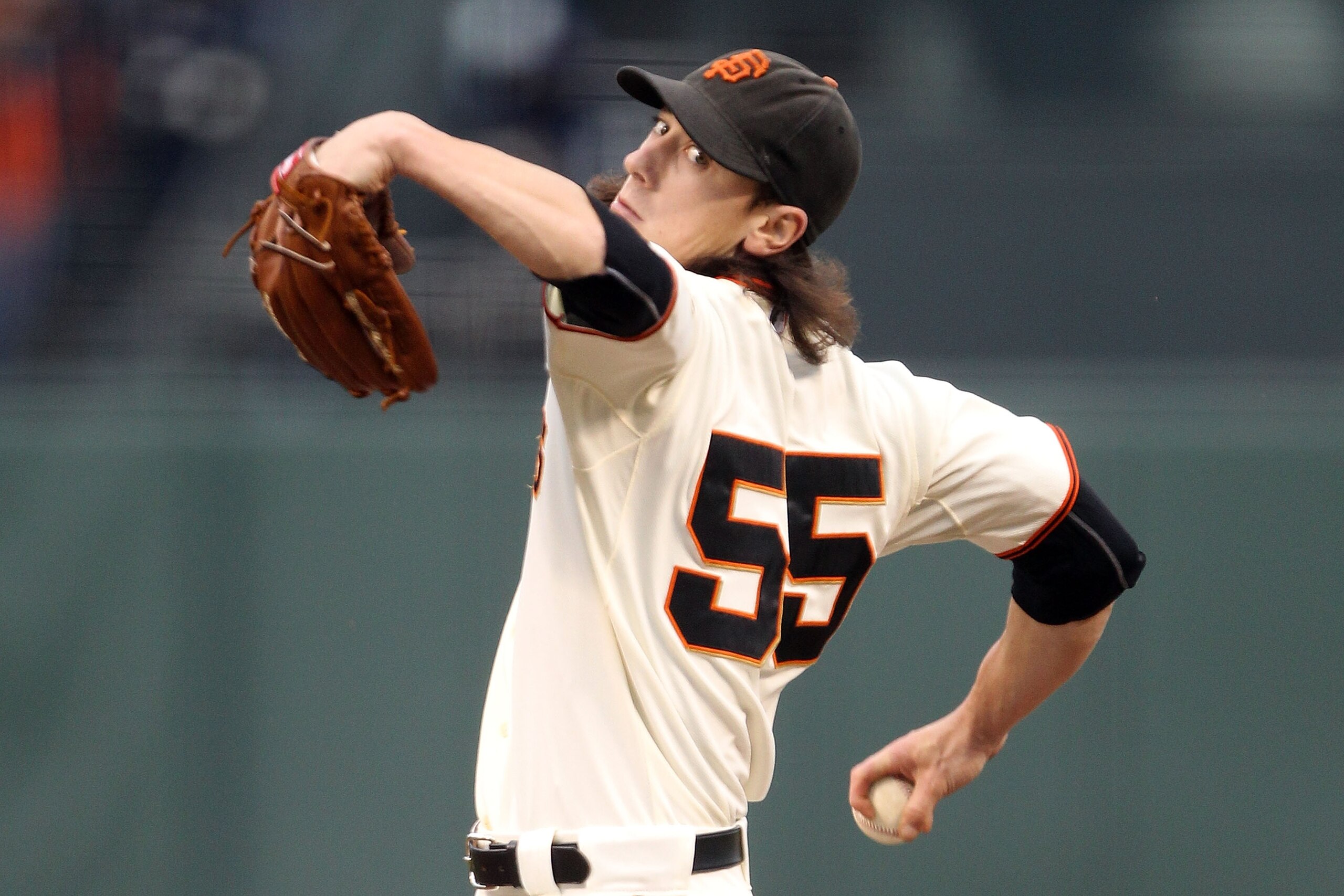 SAN FRANCISCO - OCTOBER 21:  Tim Lincecum #55 of the San Francisco Giants pitches in the first inning against the Philadelphia Phillies in Game Five of the NLCS during the 2010 MLB Playoffs at AT&T Park on October 21, 2010 in San Francisco, California.  (