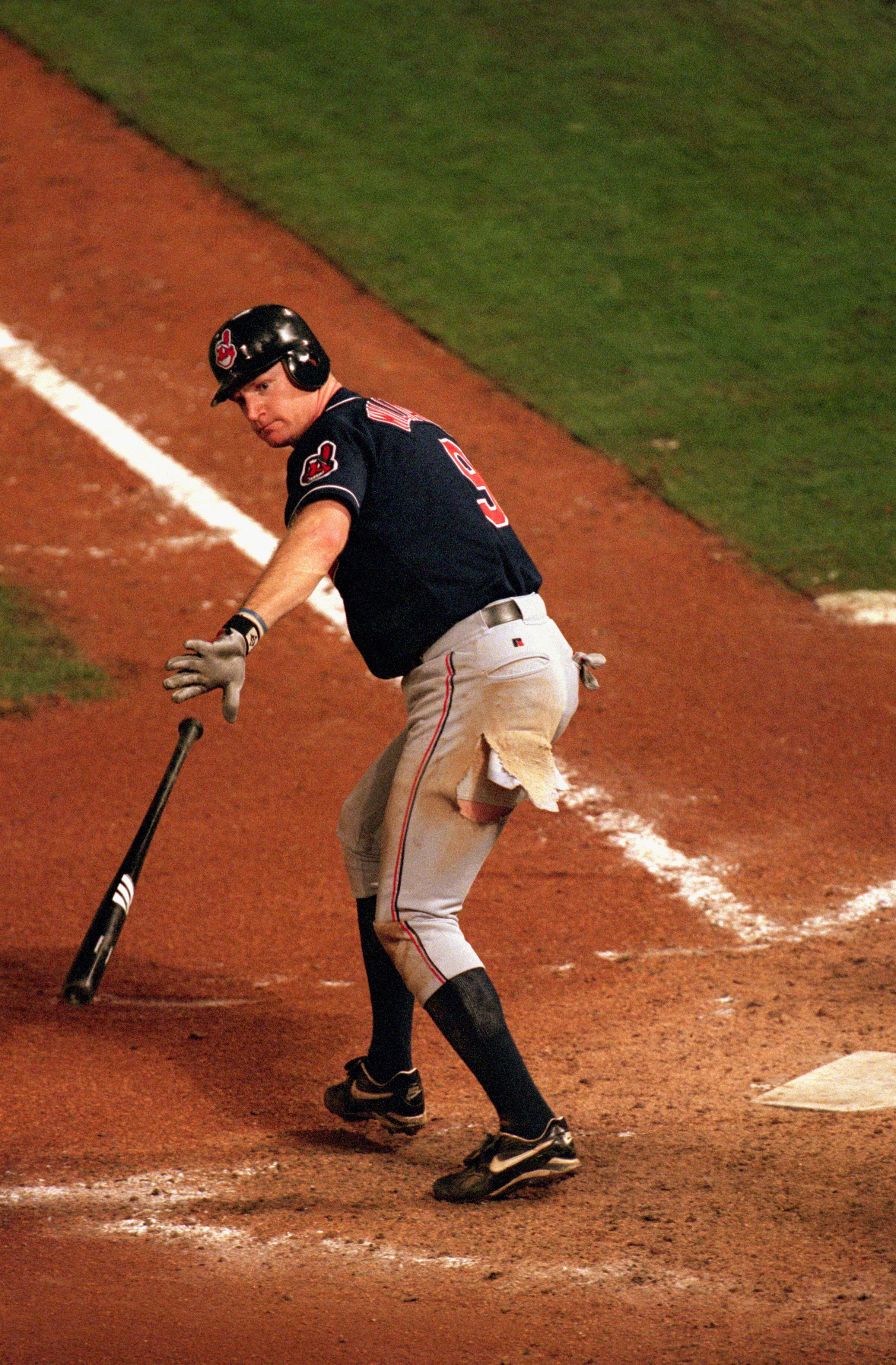 CLEVELAND - OCTOBER 26:  Matt Williams #9 of the Cleveland Indians tosses the bat during game 7 of the World Series against the Florida Marlins at Pro Player Stadium in Miami, Florida, on October 26, 1997.  The Marlins won 3-2. (Photo by Doug Pensinger/Ge