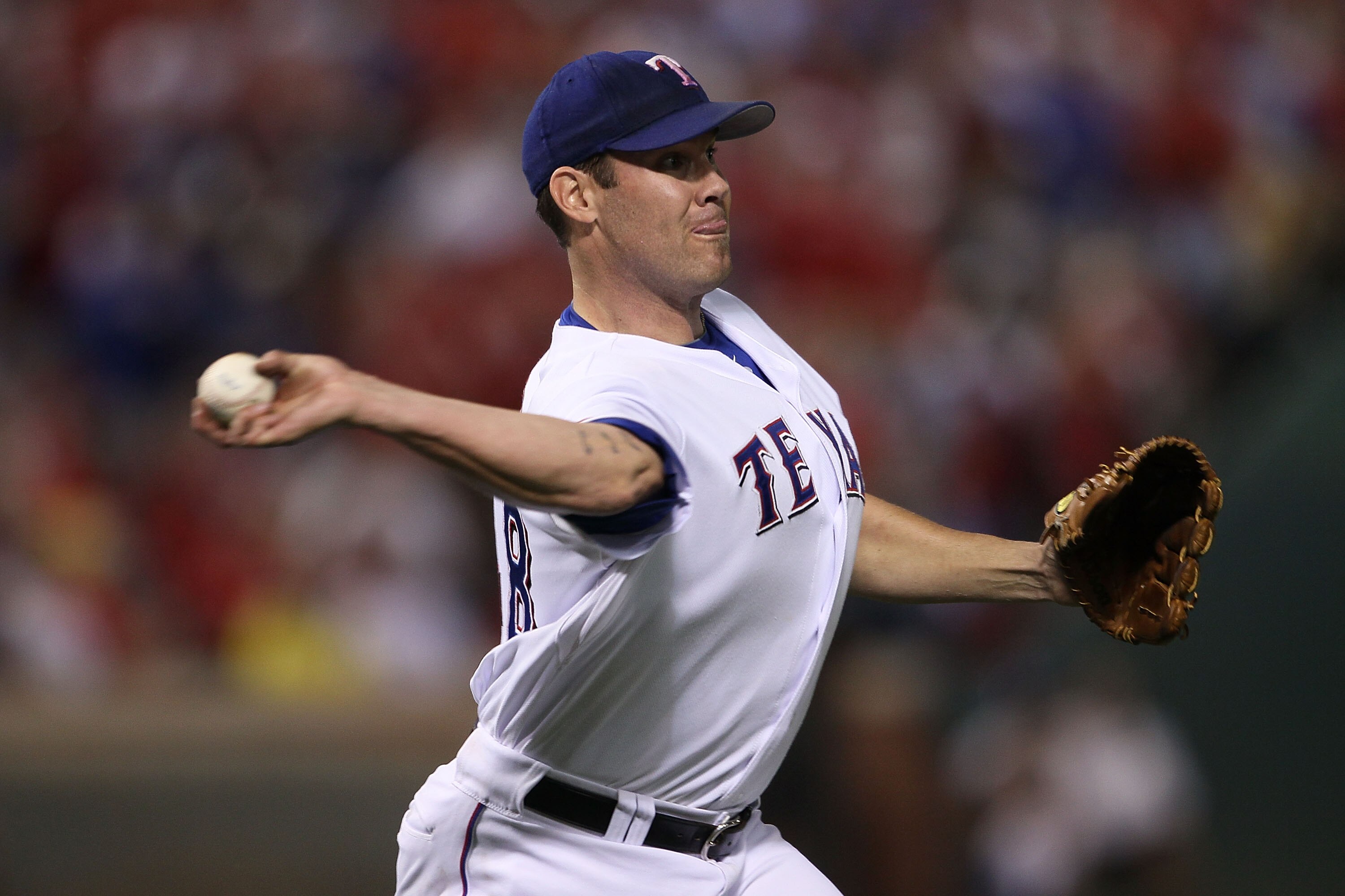 ARLINGTON, TX - OCTOBER 22:  Starting pitcher Colby Lewis #48 of the Texas Rangers pitches against the New York Yankees in Game Six of the ALCS during the 2010 MLB Playoffs at Rangers Ballpark in Arlington on October 22, 2010 in Arlington, Texas.  (Photo