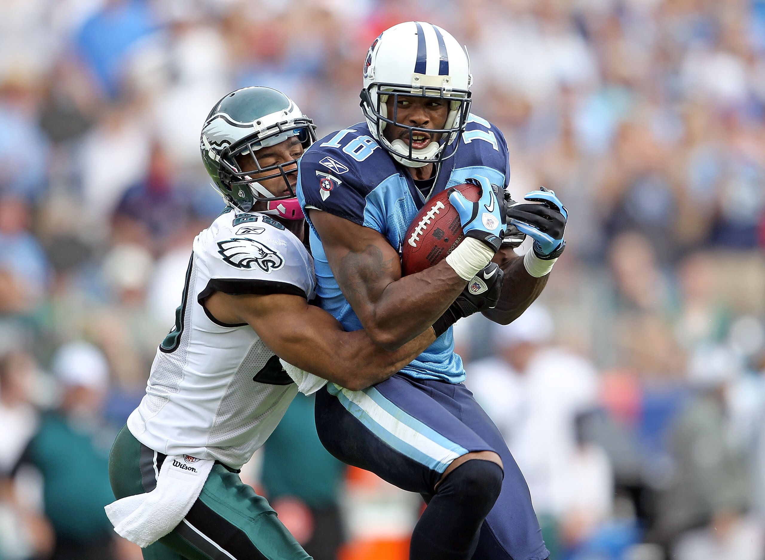 NASHVILLE, TN - OCTOBER 24: Kenny Britt #18 of the Tennessee Titans catches a pass while defended by Nate Allen #29 of the Philadelphia Eagles during the NFL game at LP Field on October 24, 2010 in Nashville, Tennessee. The Titans won 37-19. (Photo by A NASHVILLE, TN - OCTOBER 24: Kenny Britt #18 of the Tennessee Titans catches a pass while defended by Nate Allen #29 of the Philadelphia Eagles during the NFL game at LP Field on October 24, 2010 in Nashville, Tennessee. The Titans won 37-19. (Photo by A