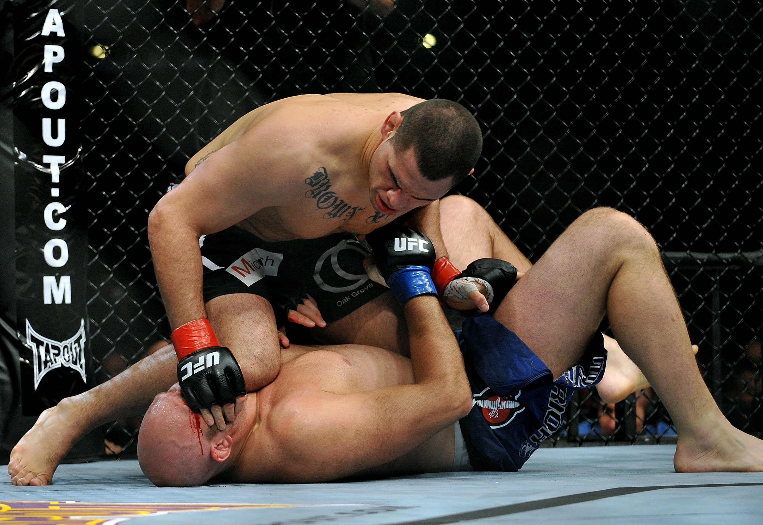 LOS ANGELES, CA - OCTOBER 24: UFC fighter Cain Velasquez (top) battles with UFC fighter Ben Rothwell (bottom) during their Heavyweight bout at UFC 104: Machida vs. Shogun at Staples Center on October 24, 2009 in Los Angeles, California. (Photo by Jon Ko LOS ANGELES, CA - OCTOBER 24: UFC fighter Cain Velasquez (top) battles with UFC fighter Ben Rothwell (bottom) during their Heavyweight bout at UFC 104: Machida vs. Shogun at Staples Center on October 24, 2009 in Los Angeles, California. (Photo by Jon Ko