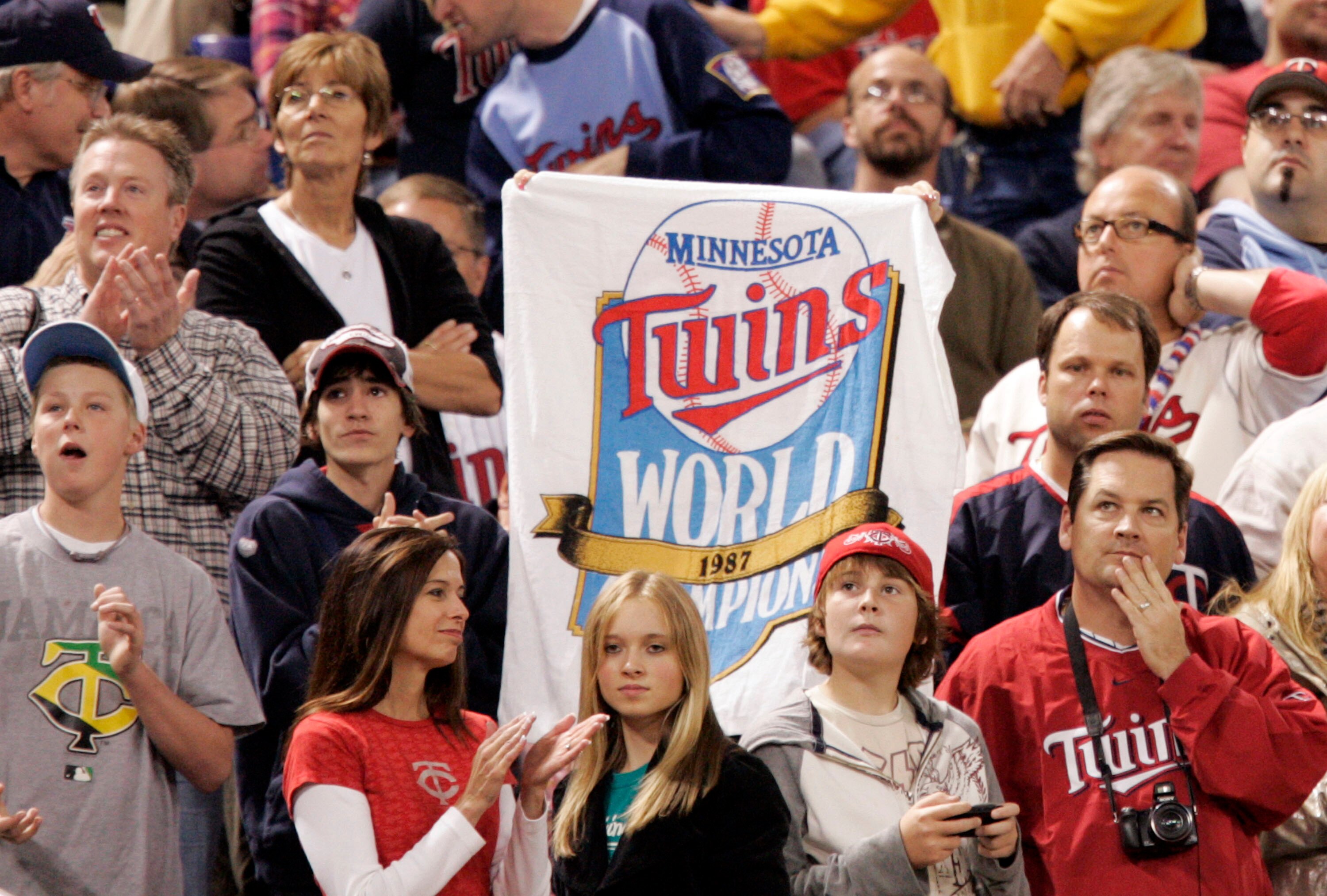 MINNEAPOLIS, MN - OCTOBER 4: A Minnesota Twins fan holds up a sign honoring the 1987 World Series winners during a tribute to the Hubert H. Humphrey Metrodome on October 4, 2009 in Minneapolis, Minnesota. (Photo by Genevieve Ross/Getty Images)