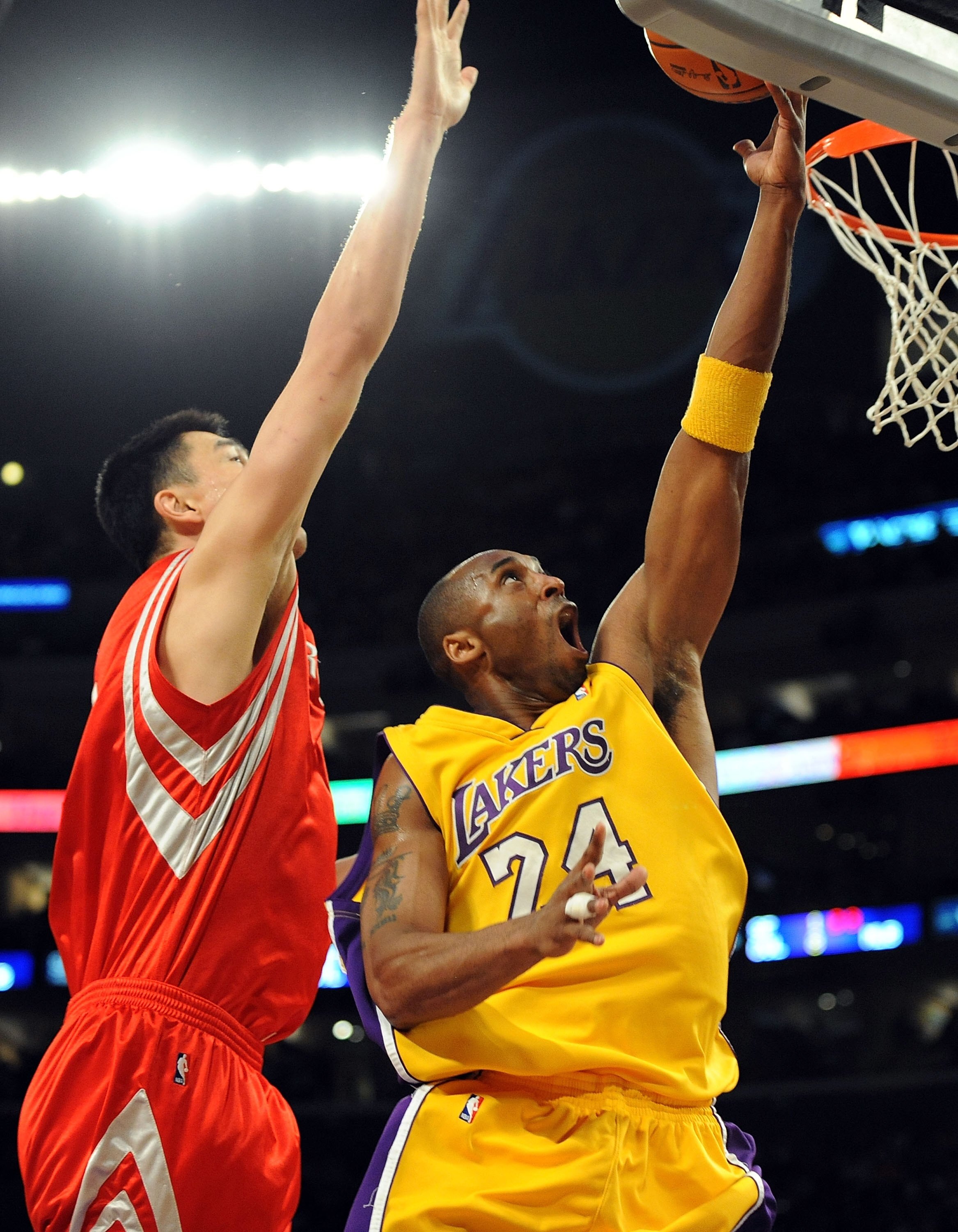 LOS ANGELES, CA - MAY 06:  Kobe Bryant #24 of the Los Angeles Lakers goes up for a shot against Yao Ming #11 of the Houston Rockets in the first half of Game Two of the Western Conference Semifinals during the 2009 NBA Playoffs at Staples Center on May 6,