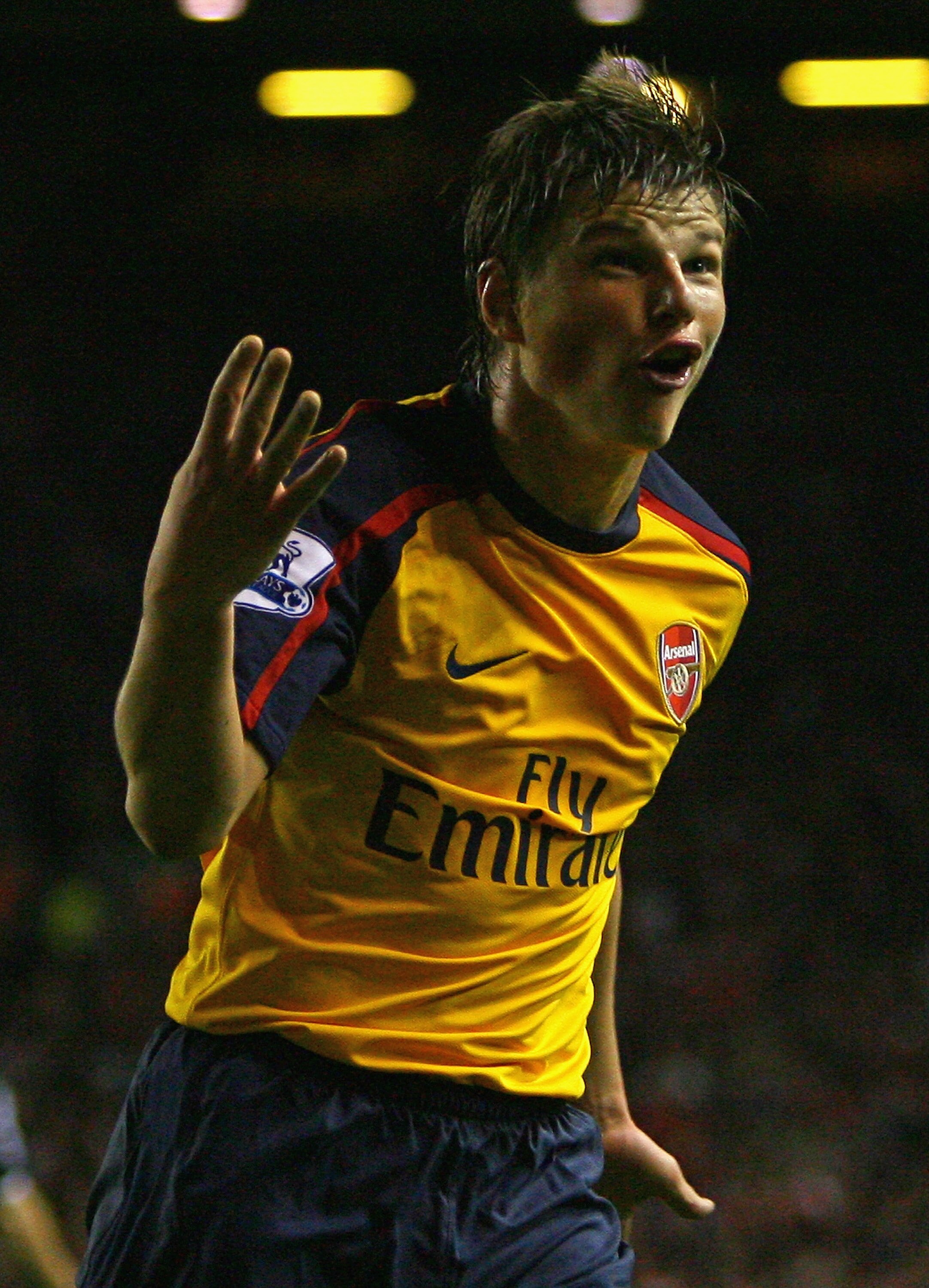 LIVERPOOL, UNITED KINGDOM - APRIL 21: Andrey Arshavin of Arsenal celebrates scoring his team's and his fourth goal during the Barclays Premier League match between Liverpool and Arsenal at Anfield on April 21, 2009 in Liverpool, England. (Photo by Alex LIVERPOOL, UNITED KINGDOM - APRIL 21: Andrey Arshavin of Arsenal celebrates scoring his team's and his fourth goal during the Barclays Premier League match between Liverpool and Arsenal at Anfield on April 21, 2009 in Liverpool, England. (Photo by Alex