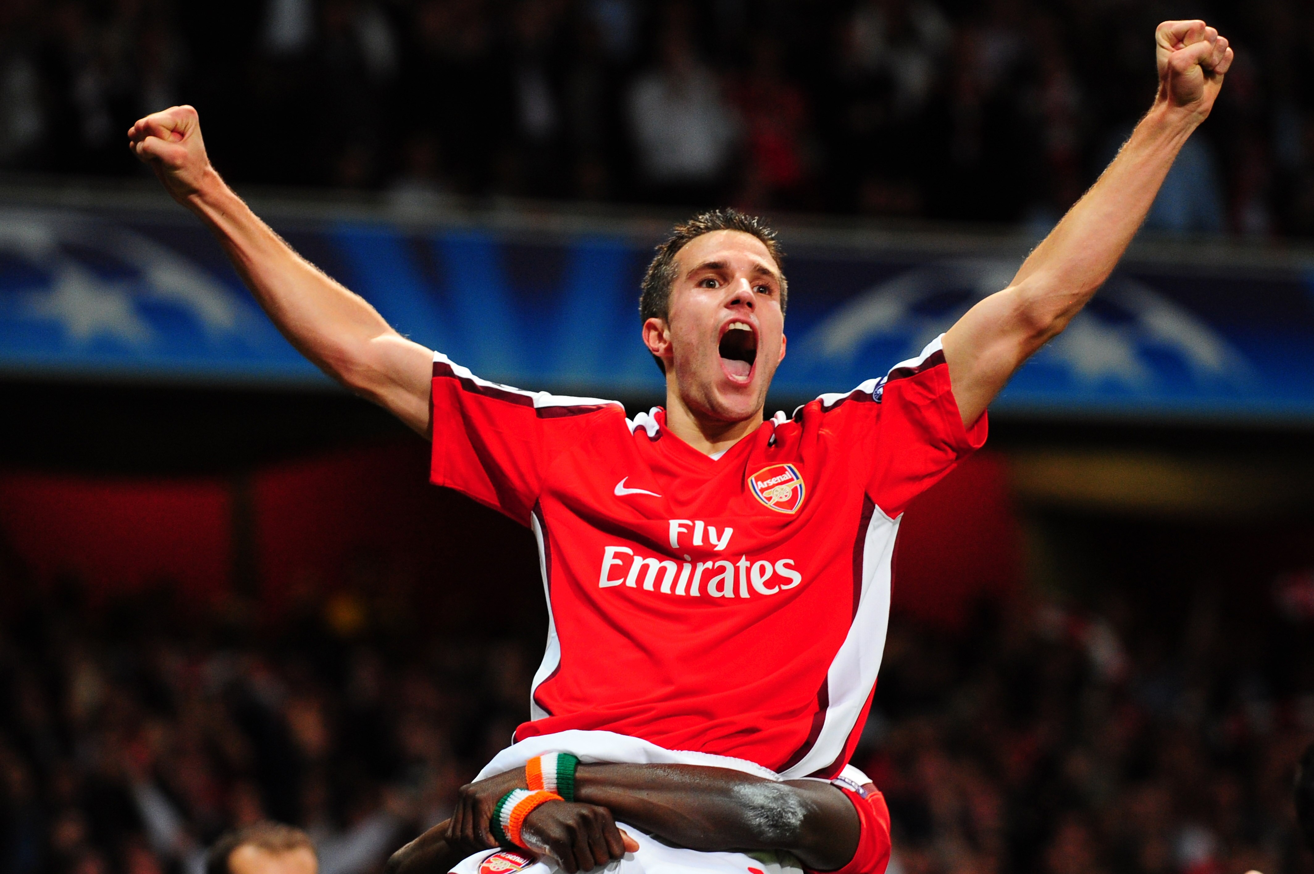 LONDON, ENGLAND - SEPTEMBER 29: Robin van Persie of Arsenal celebrates after he scored the first goal during the UEFA Champions League Group H match between Arsenal and Olympiakos at the Emirates Stadium on September 29, 2009 in London, England. (Photo LONDON, ENGLAND - SEPTEMBER 29: Robin van Persie of Arsenal celebrates after he scored the first goal during the UEFA Champions League Group H match between Arsenal and Olympiakos at the Emirates Stadium on September 29, 2009 in London, England. (Photo