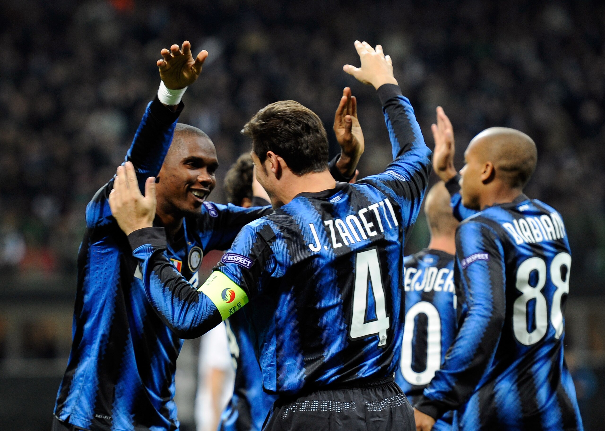 MILAN, ITALY - OCTOBER 20:  Javier Zanetti and Samuel Eto'o of Inter Milan celebrates after the first goal during the UEFA Champions League group A match between FC Internazionale Milano and Tottenham Hotspur at Stadio Giuseppe Meazza on October 20, 2010