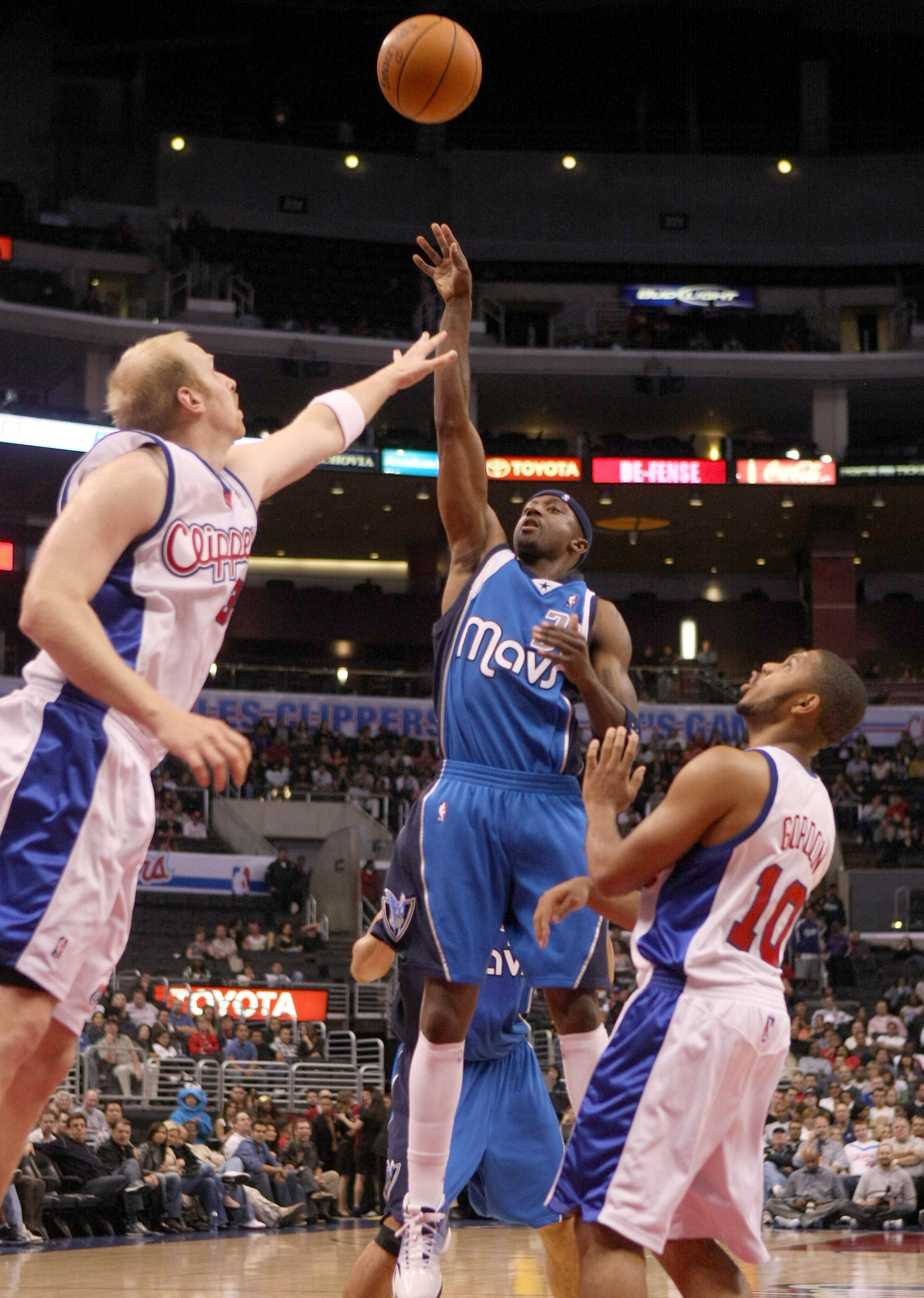 LOS ANGELES - OCTOBER 31: Jason Terry #31 of the Dallas Mavericks shoots over Kris Kaman #35 and Eric Gordon #10 of the Los Angeles Clippers on October 31, 2009 at Staples Center in Los Angeles, California.  NOTE TO USER: User expressly acknowledges and a