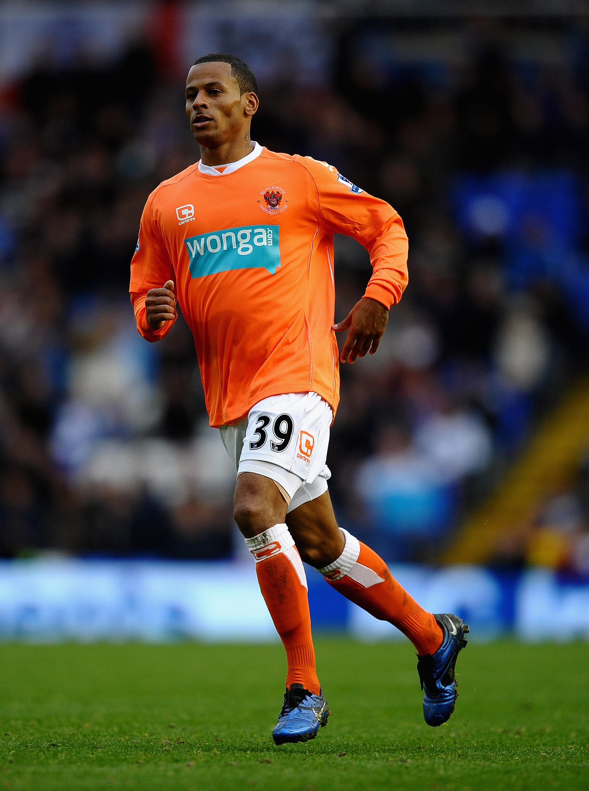 BIRMINGHAM, ENGLAND - OCTOBER 23: DJ Campbell of Blackpool in action during the Barclays Premier League match between Birmingham City and Blackpool at St Andrews on October 23, 2010 in Birmingham, England.  (Photo by Laurence Griffiths/Getty Images)
