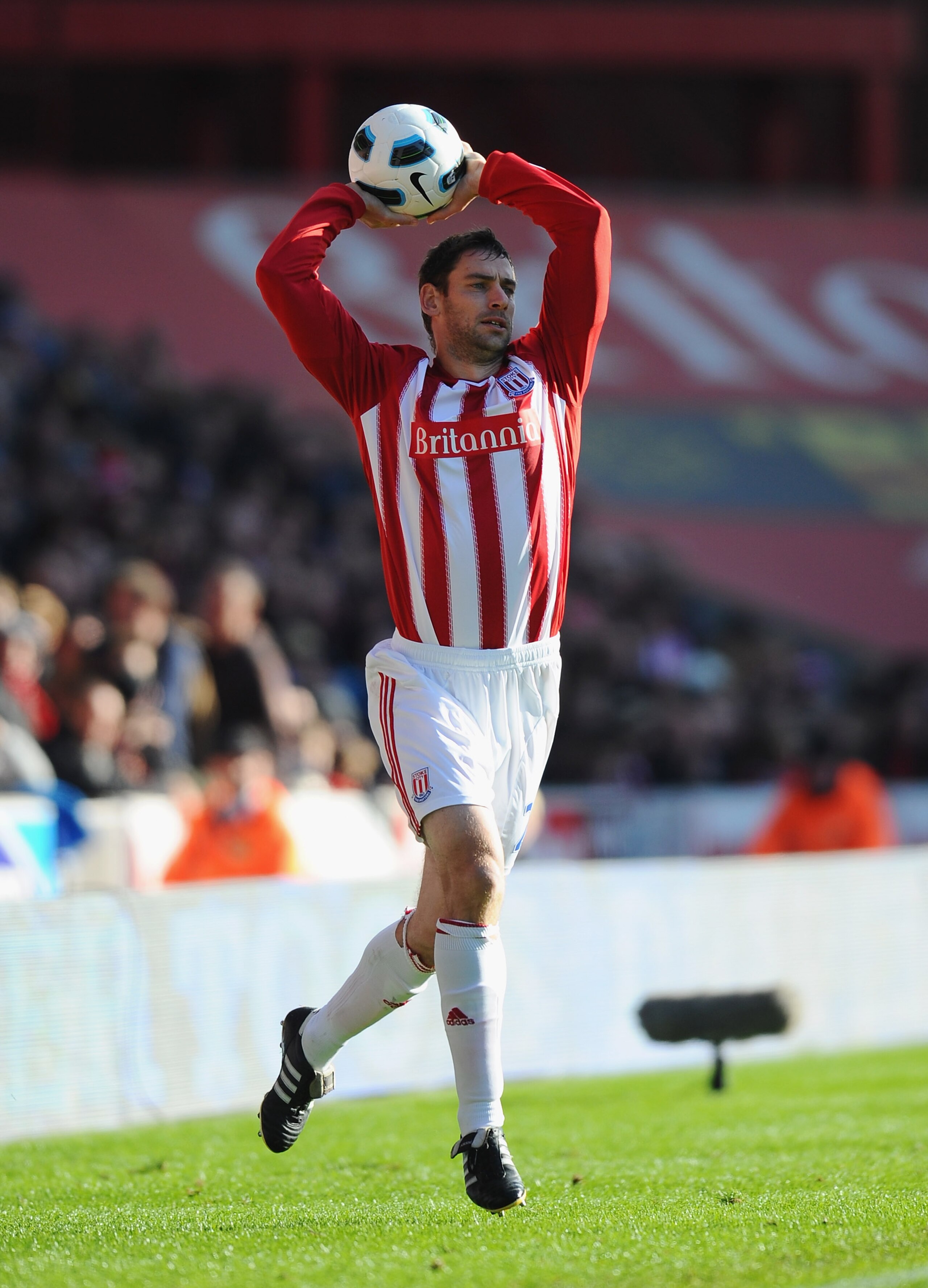 STOKE ON TRENT, ENGLAND - OCTOBER 24:  Rory Delap of Stoke takes a throw in during the Barclays Premier League match between Stoke City and Manchester United at Britannia Stadium on October 24, 2010 in Stoke on Trent, England.  (Photo by Mike Hewitt/Getty