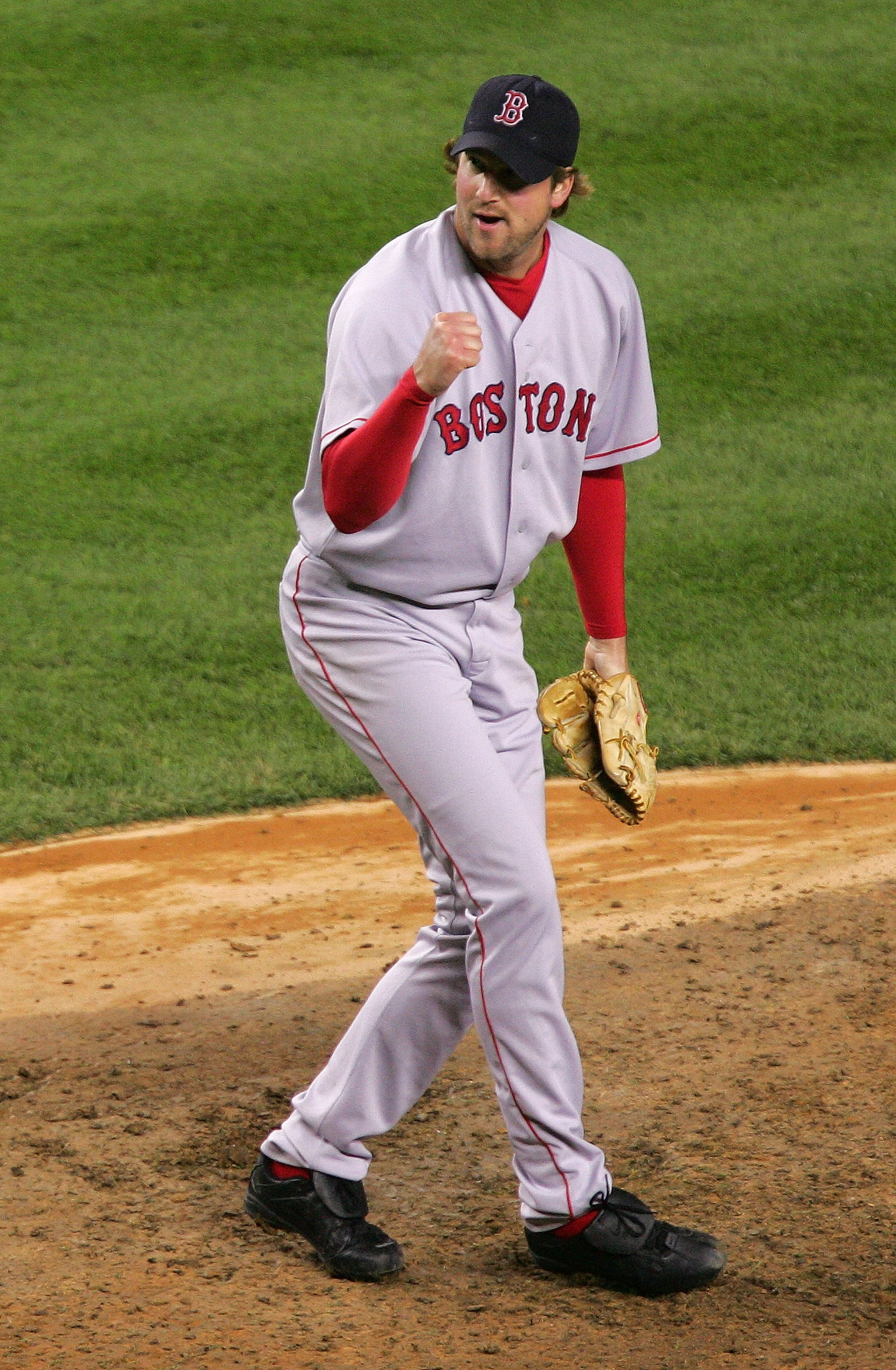 NEW YORK - OCTOBER 20:  Pitcher Derek Lowe #32 of the Boston Red Sox celebrates the end of the sixth inning against the New York Yankees during game seven of the American League Championship Series on October 20, 2004 at Yankee Stadium in the Bronx boroug