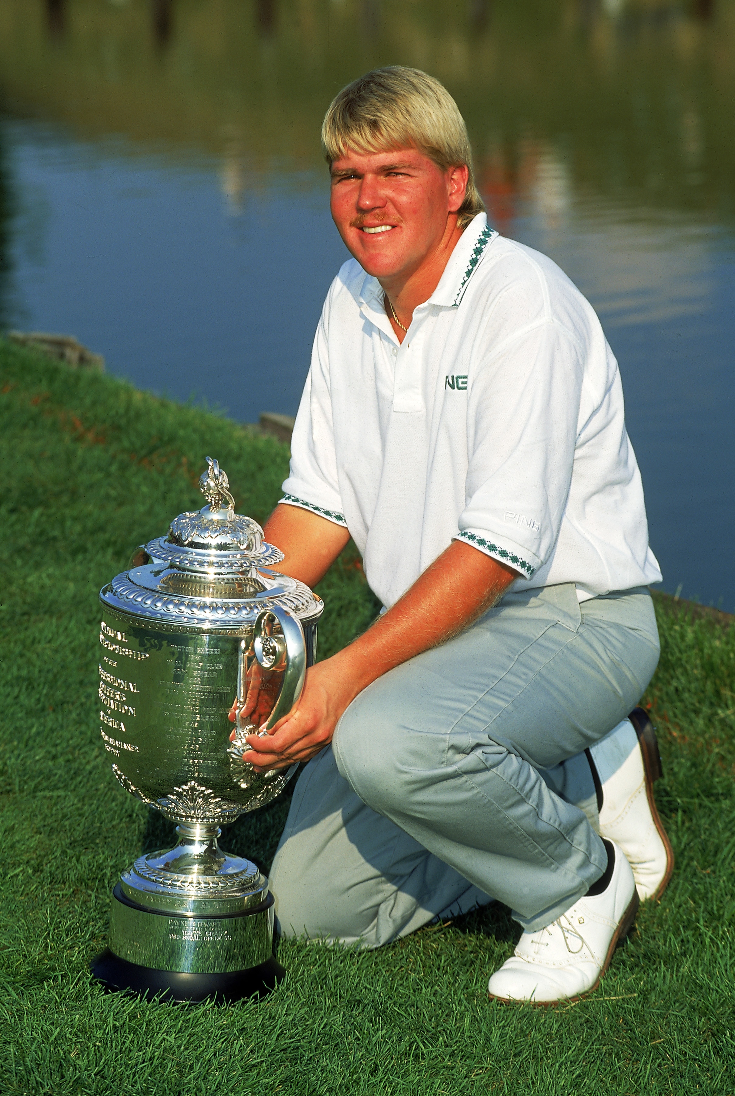 CROOKED STICK - AUGUST:  John Daly of the USA with the trophy after winning the USPGA Championship at Crooked Stick in Carmel, Indiana, USA in August 1991. (photo by Stephen Munday/Getty Images)