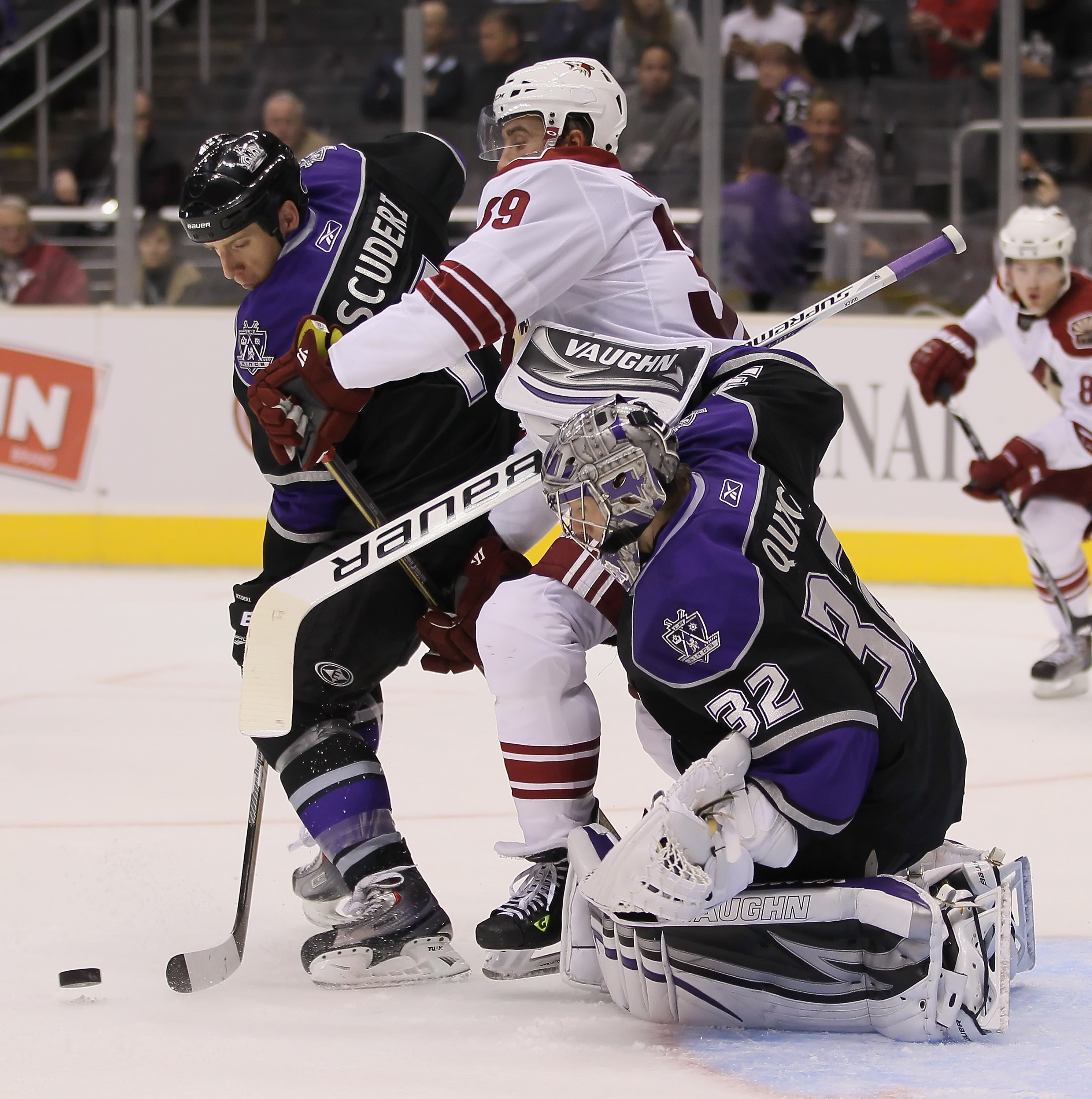 LOS ANGELES, CA - SEPTEMBER 23:  (L-R) Rob Scuderi #7 of the Los Angeles Kings and Brett MacLean #39 of the Phoenix Coyotes screen goaltender Jonathan Quick #32 of the Kings in the third period at Staples Center on September 23, 2010 in Los Angeles, Calif