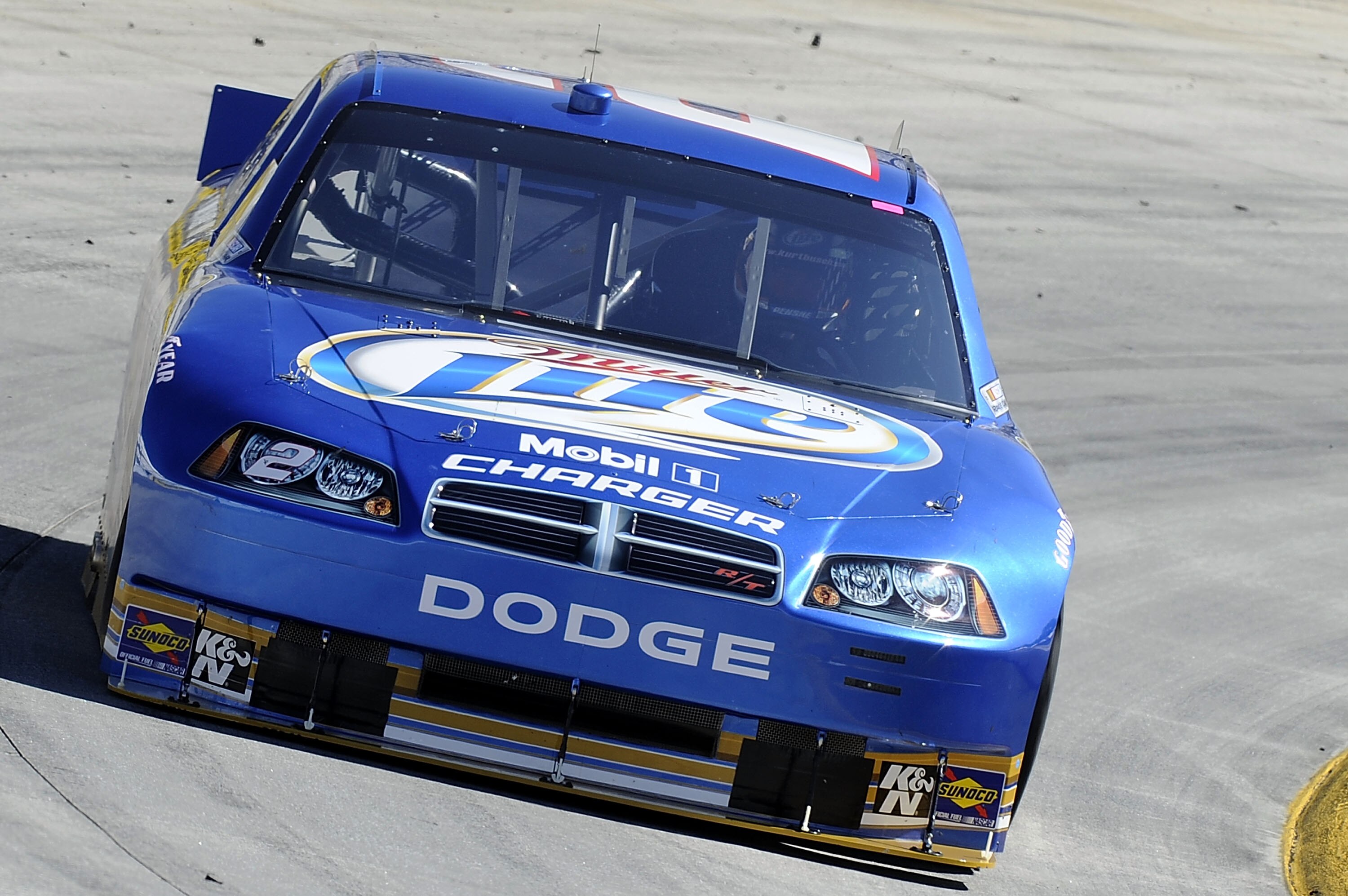 MARTINSVILLE, VA - OCTOBER 22:  Kurt Busch drives the #2 Operation Home Front/Miller Lite Dodge during practice for the NASCAR Sprint Cup Series TUMS Fast Relief 500 at Martinsville Speedway on October 22, 2010 in Martinsville, Virginia.  (Photo by John H